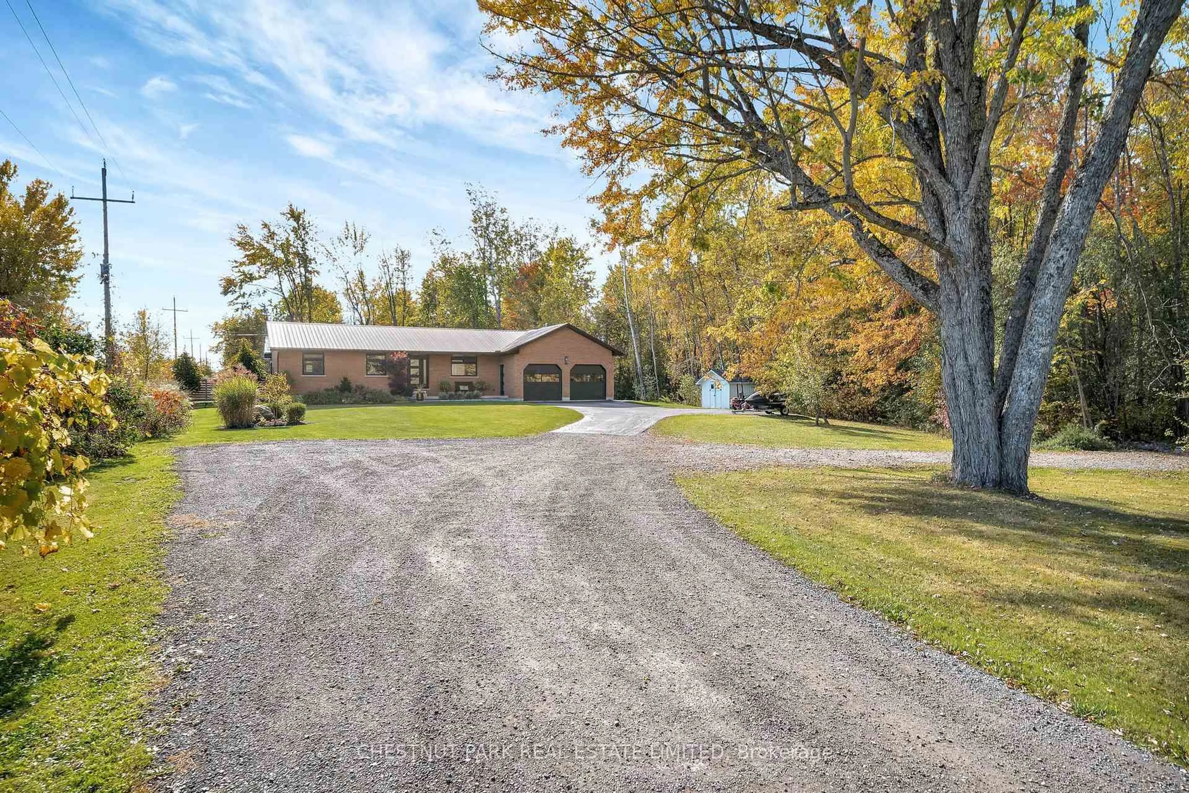 A pic from outside/outdoor area/front of a property/back of a property/a pic from drone, water/lake/river/ocean view for 407 County Road 4, Prince Edward County Ontario K0K 2T0