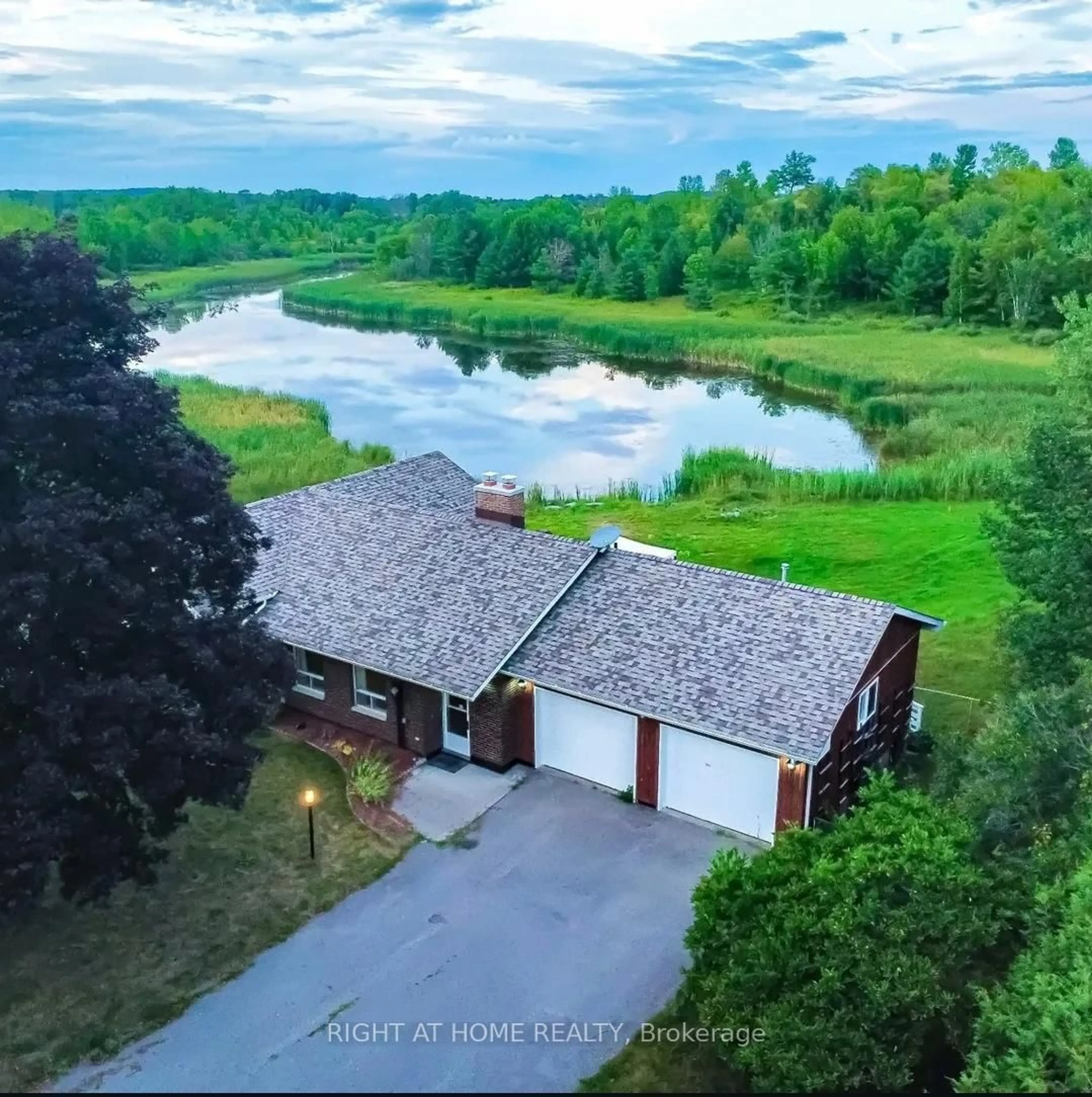 A pic from outside/outdoor area/front of a property/back of a property/a pic from drone, water/lake/river/ocean view for 1 Oak St, Trent Hills Ontario K0L 1L0