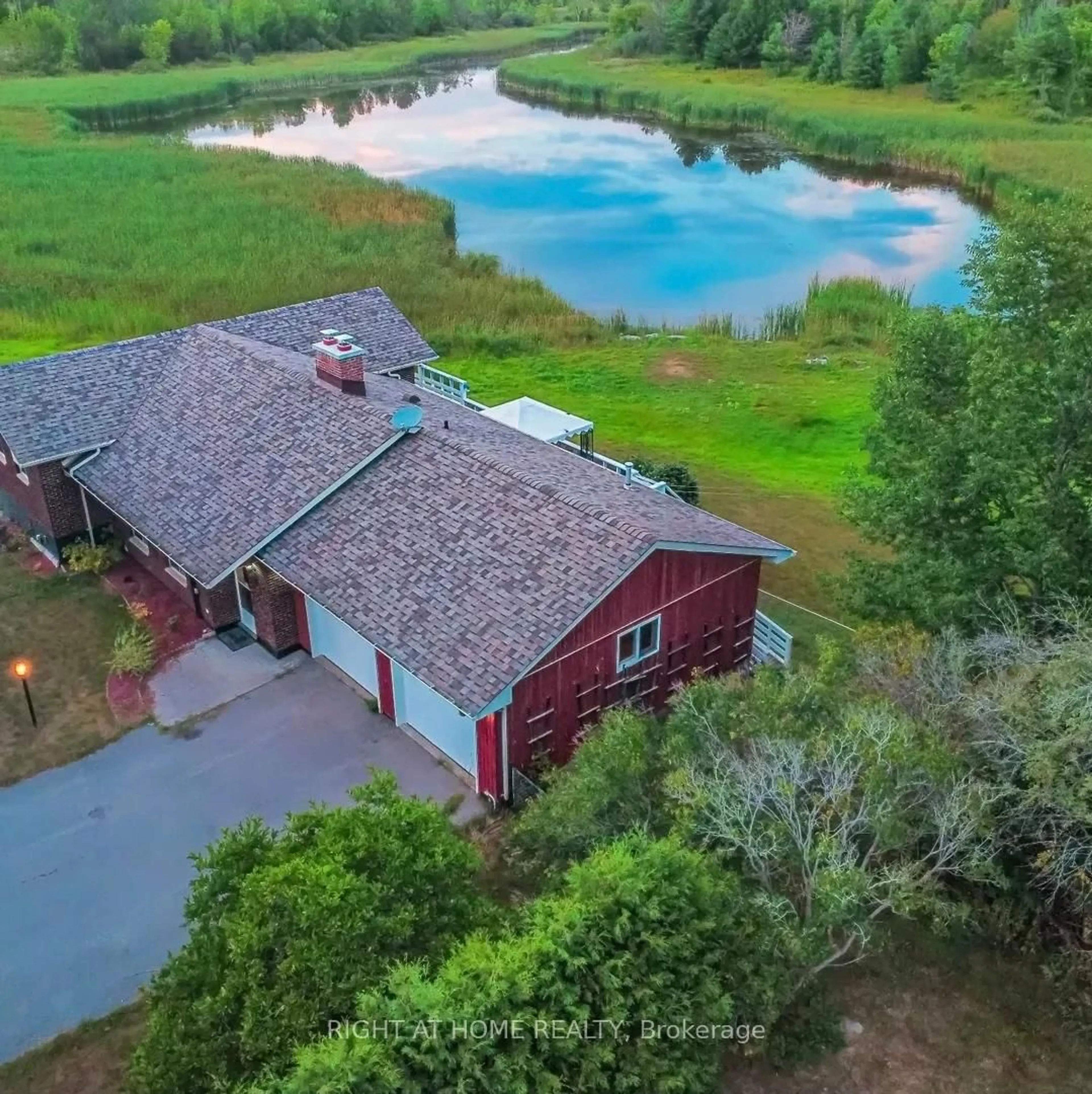 A pic from outside/outdoor area/front of a property/back of a property/a pic from drone, water/lake/river/ocean view for 1 Oak St, Trent Hills Ontario K0L 1L0