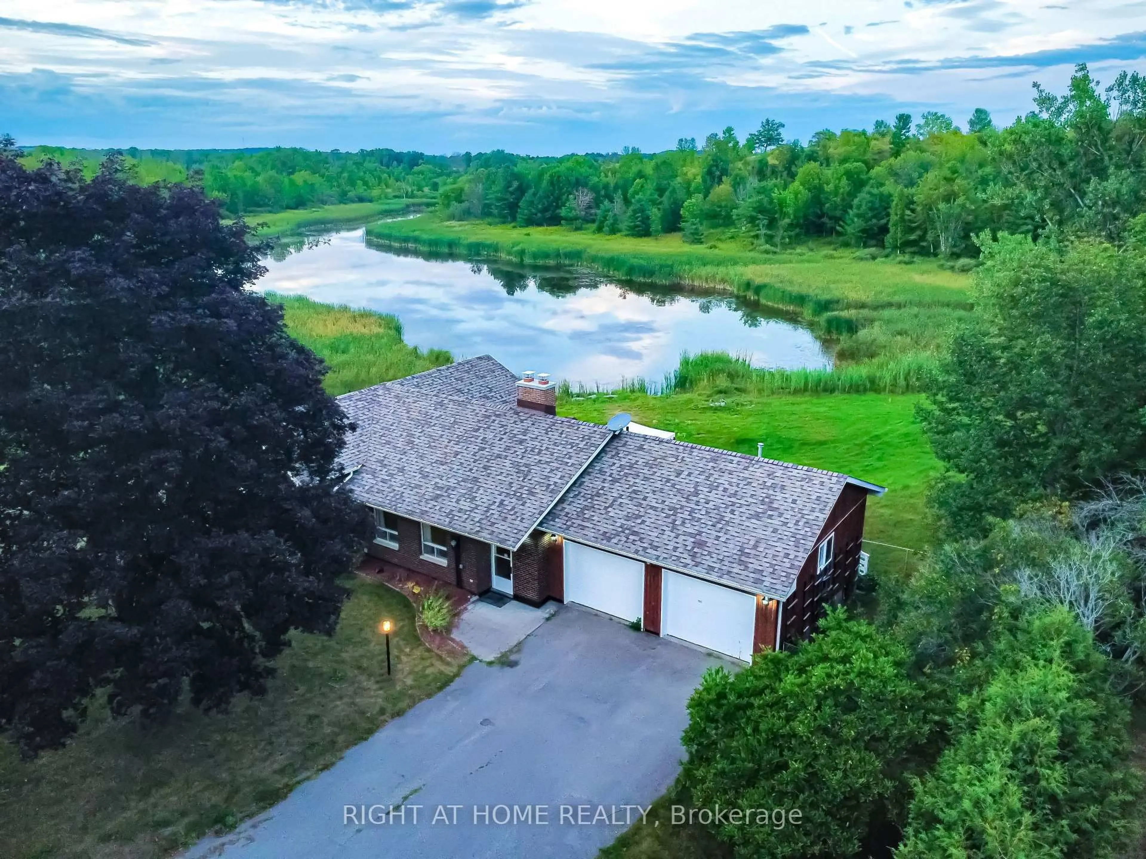 A pic from outside/outdoor area/front of a property/back of a property/a pic from drone, water/lake/river/ocean view for 1 Oak St, Trent Hills Ontario K0L 1L0