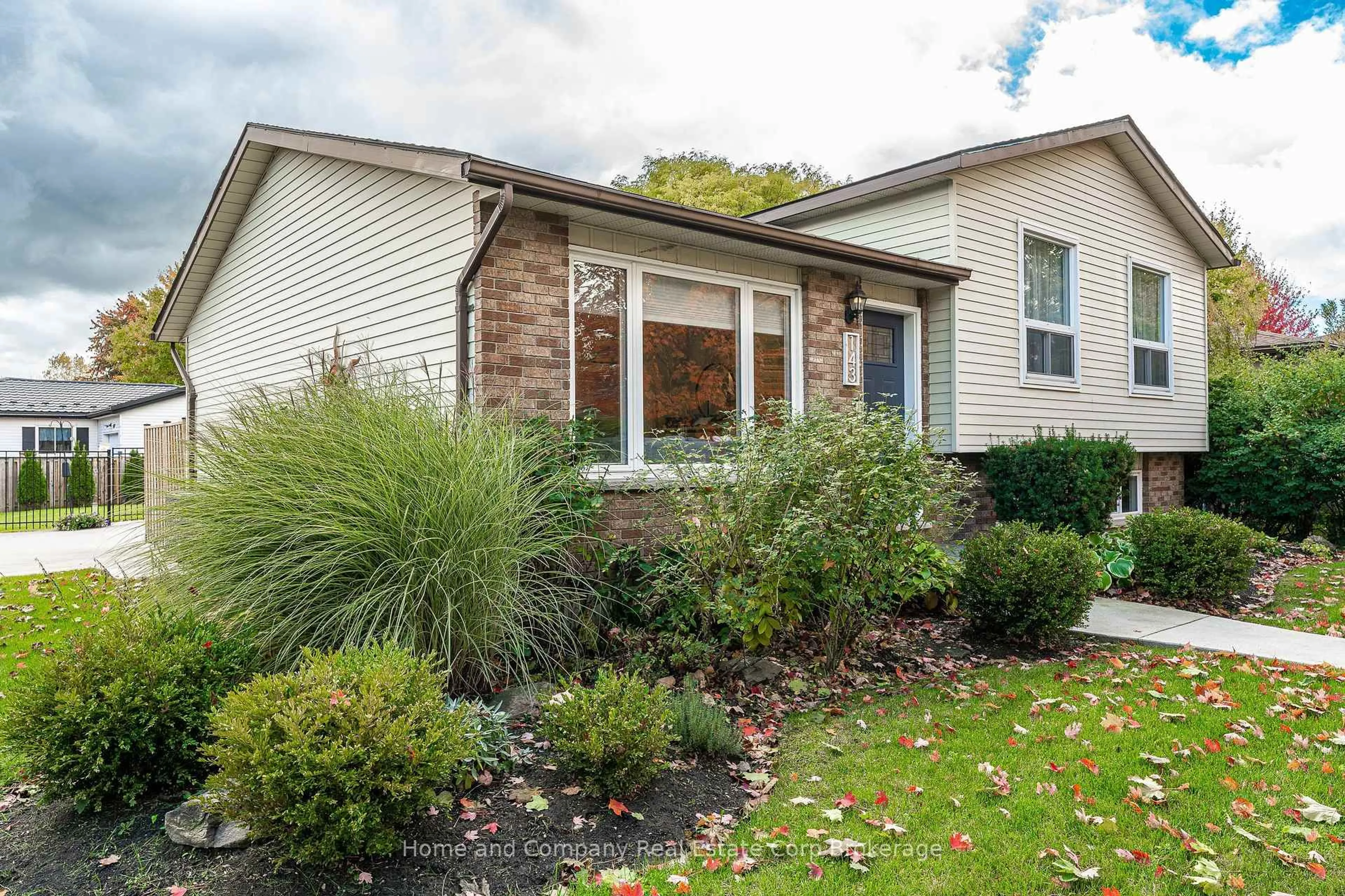 Home with vinyl exterior material, street for 143 Greenwood Dr, Stratford Ontario N5A 7K3