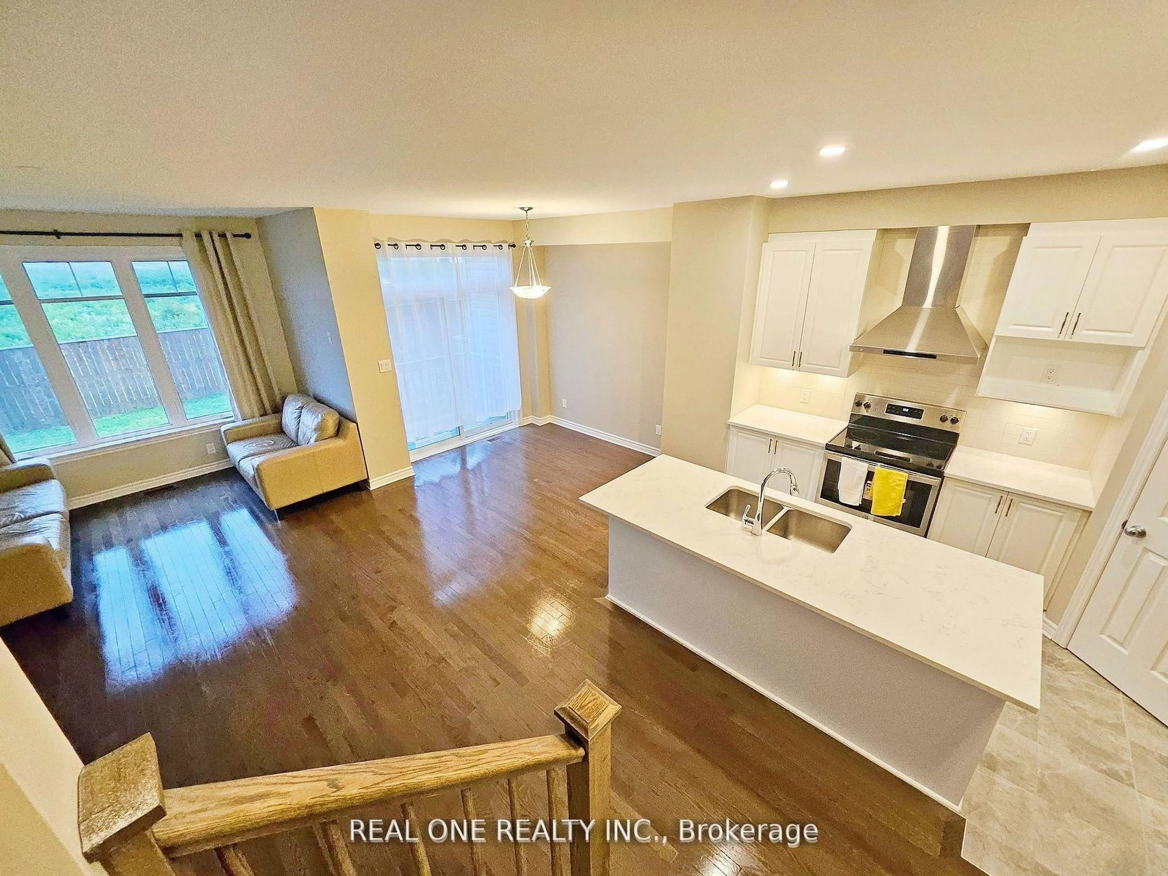 Open concept kitchen, wood/laminate floor for 1103 Barrow Ave, Kingston Ontario K7M 0G5