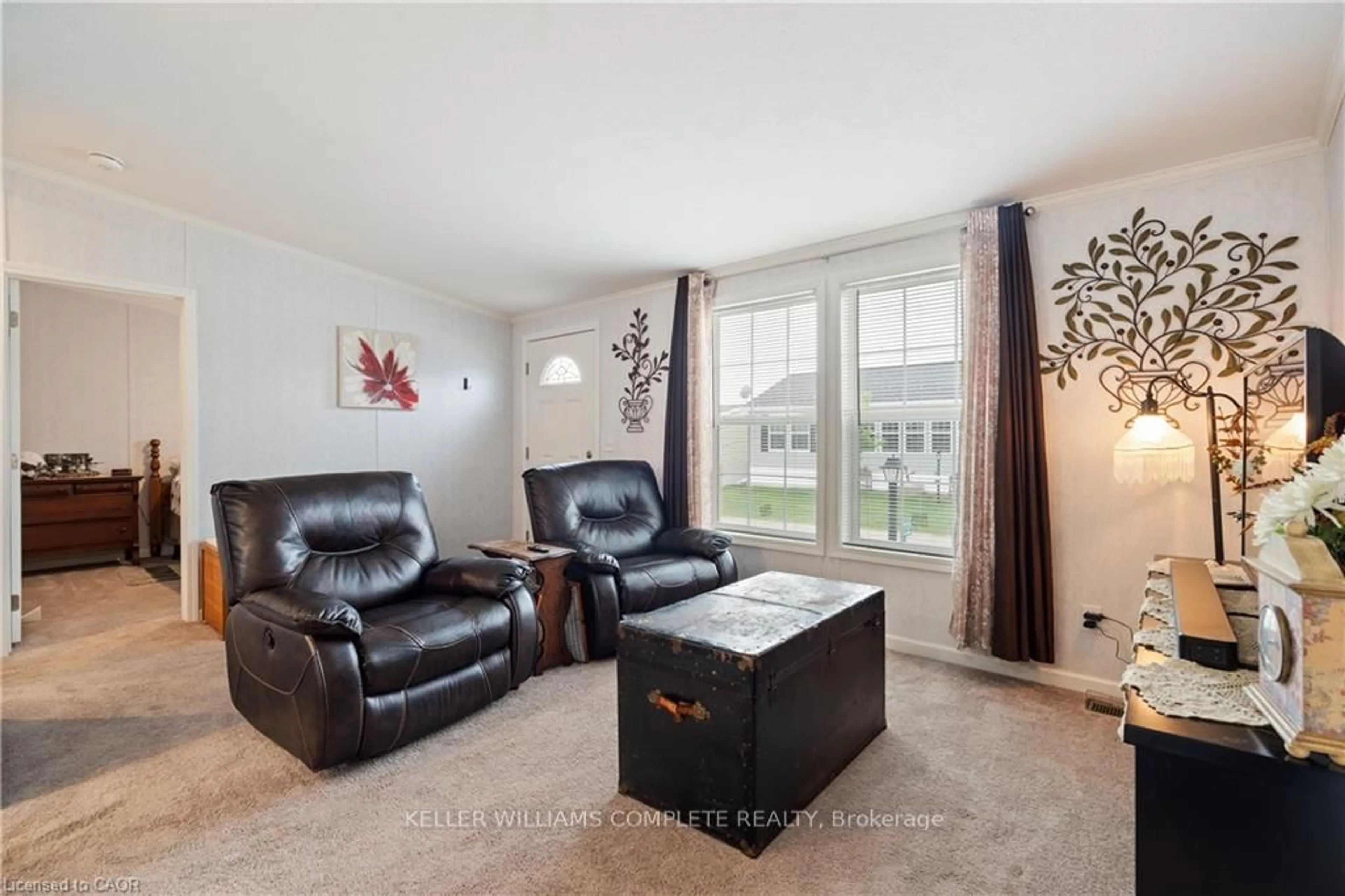 Living room with furniture, unknown for 22 Copper Beech Dr, Haldimand Ontario N0A 1L0