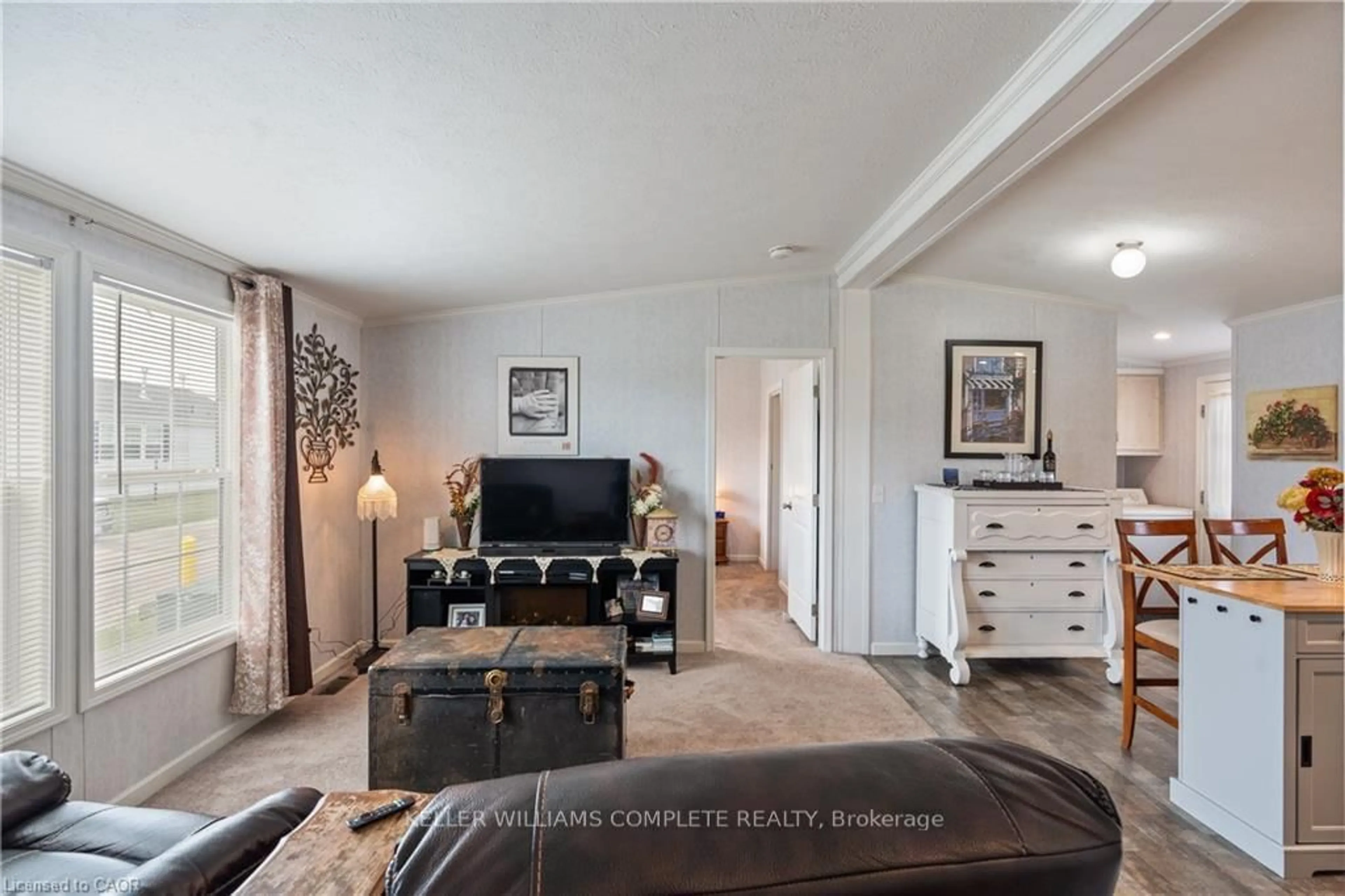 Living room with furniture, unknown for 22 Copper Beech Dr, Haldimand Ontario N0A 1L0