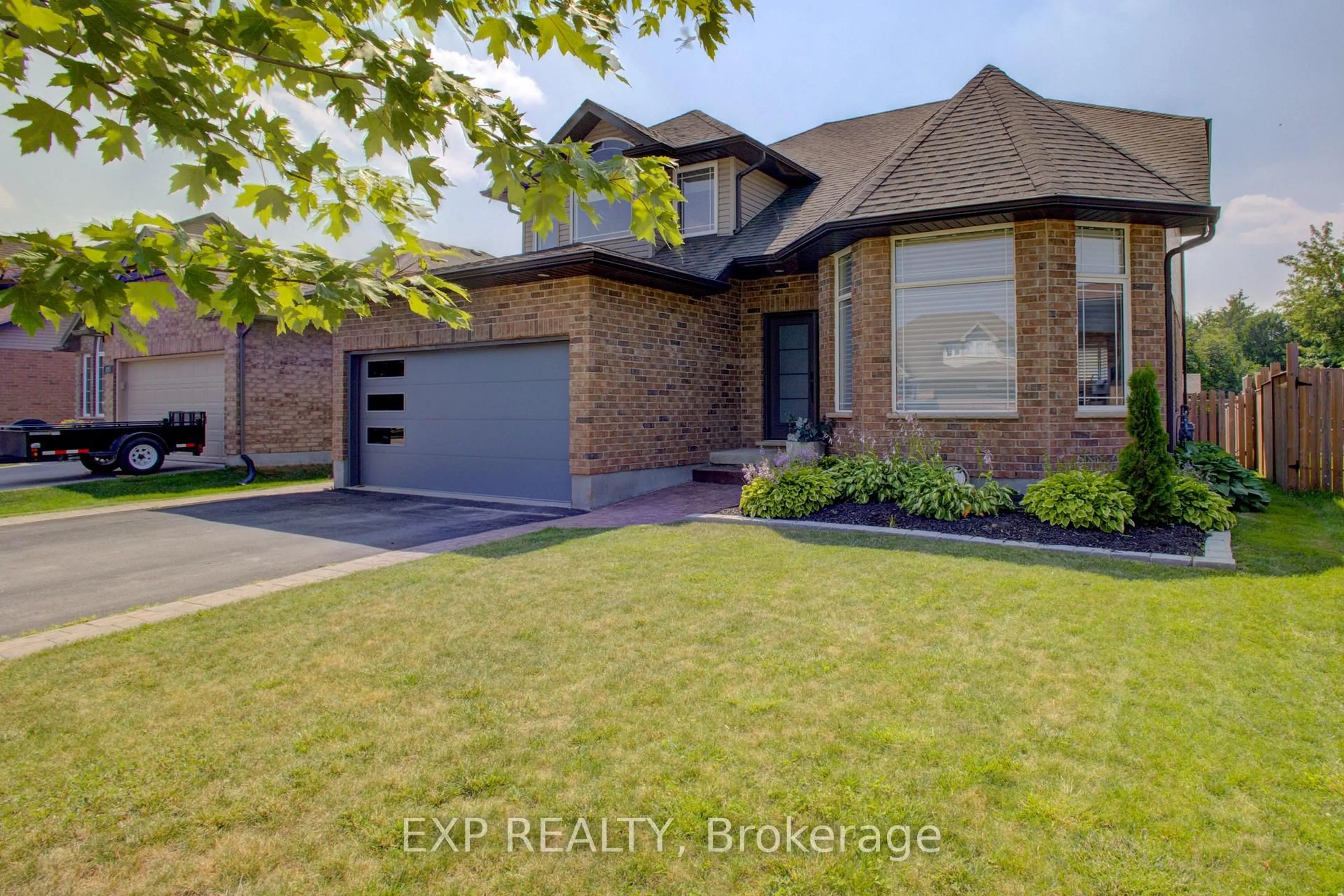 Home with brick exterior material, street for 128 Schmidt Dr, Wellington North Ontario N0G 1A0