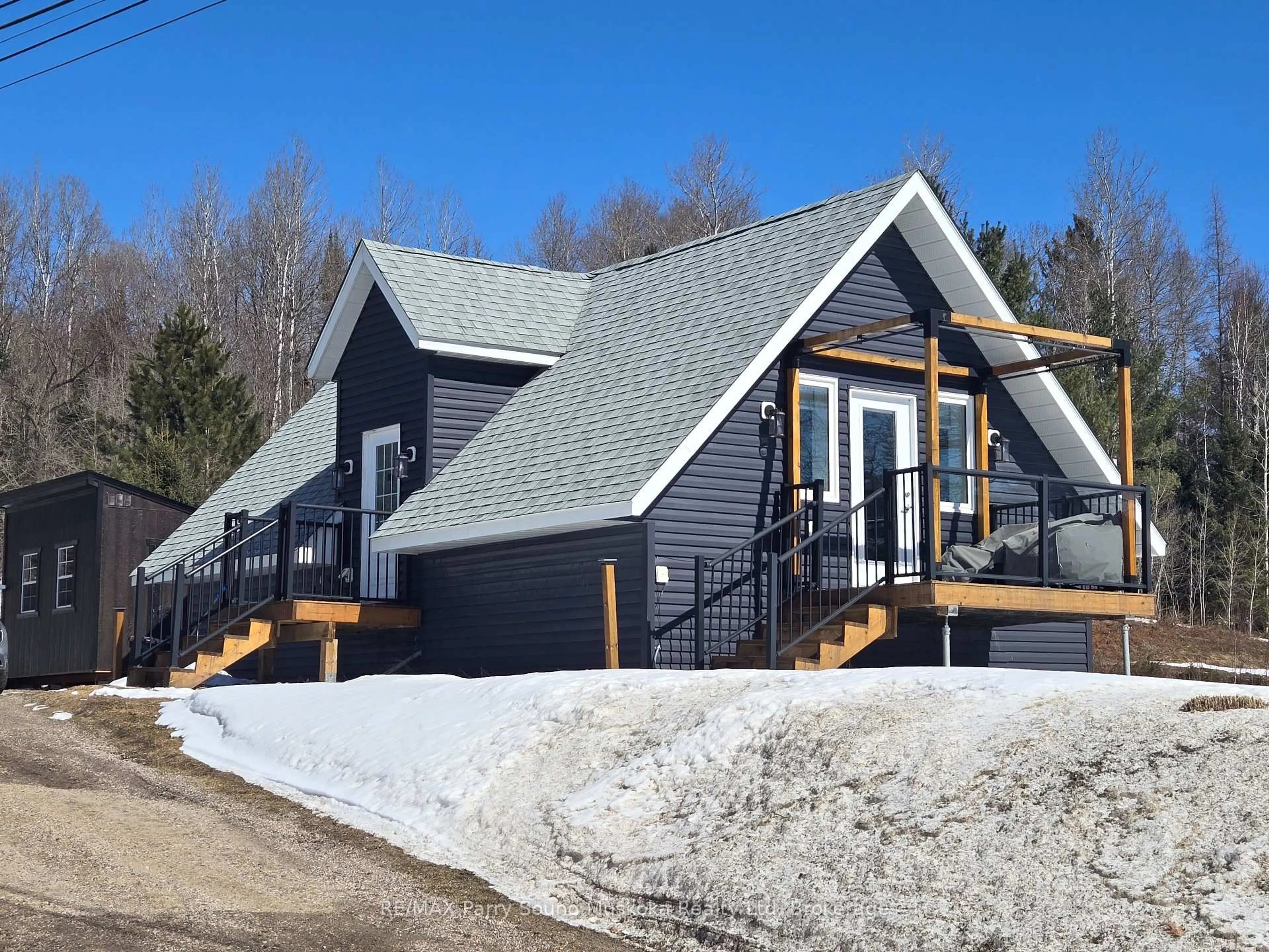 Home with vinyl exterior material, mountain view for 141 Hwy 520 Highway, Armour Ontario P0A 1C0