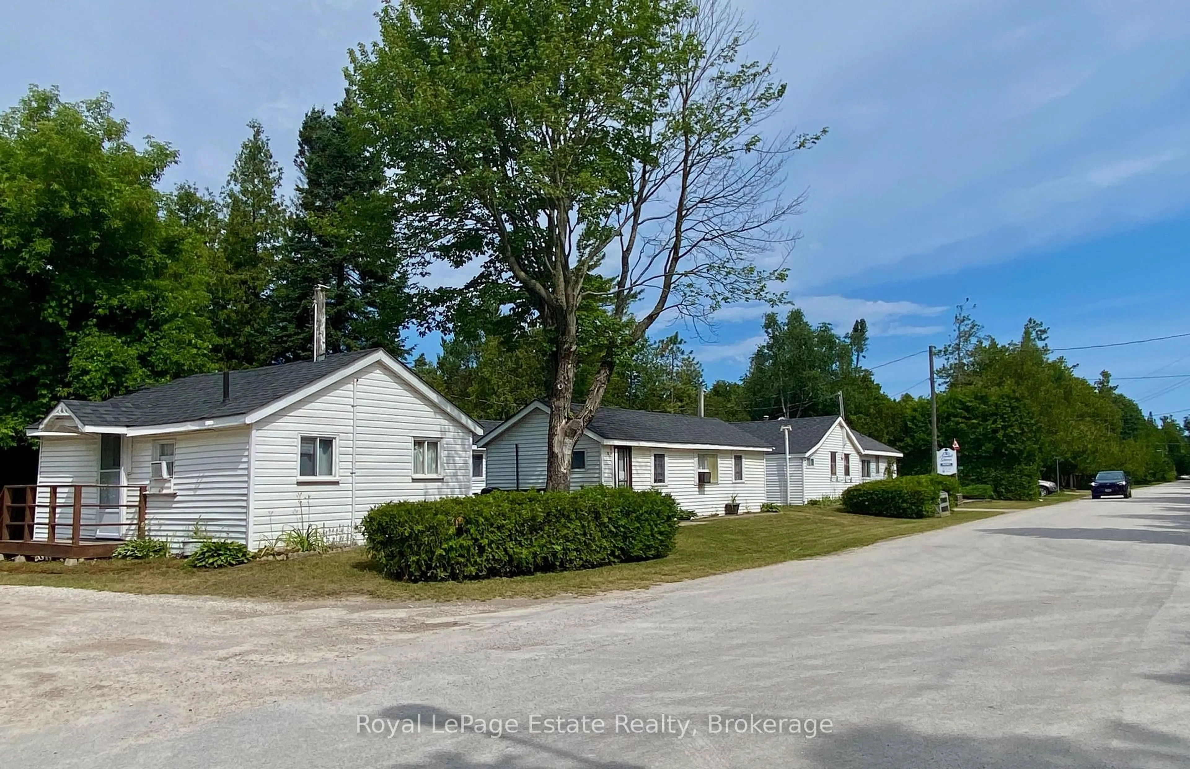 A pic from outside/outdoor area/front of a property/back of a property/a pic from drone, street for 104 Third Ave, South Bruce Peninsula Ontario N0H 2G0