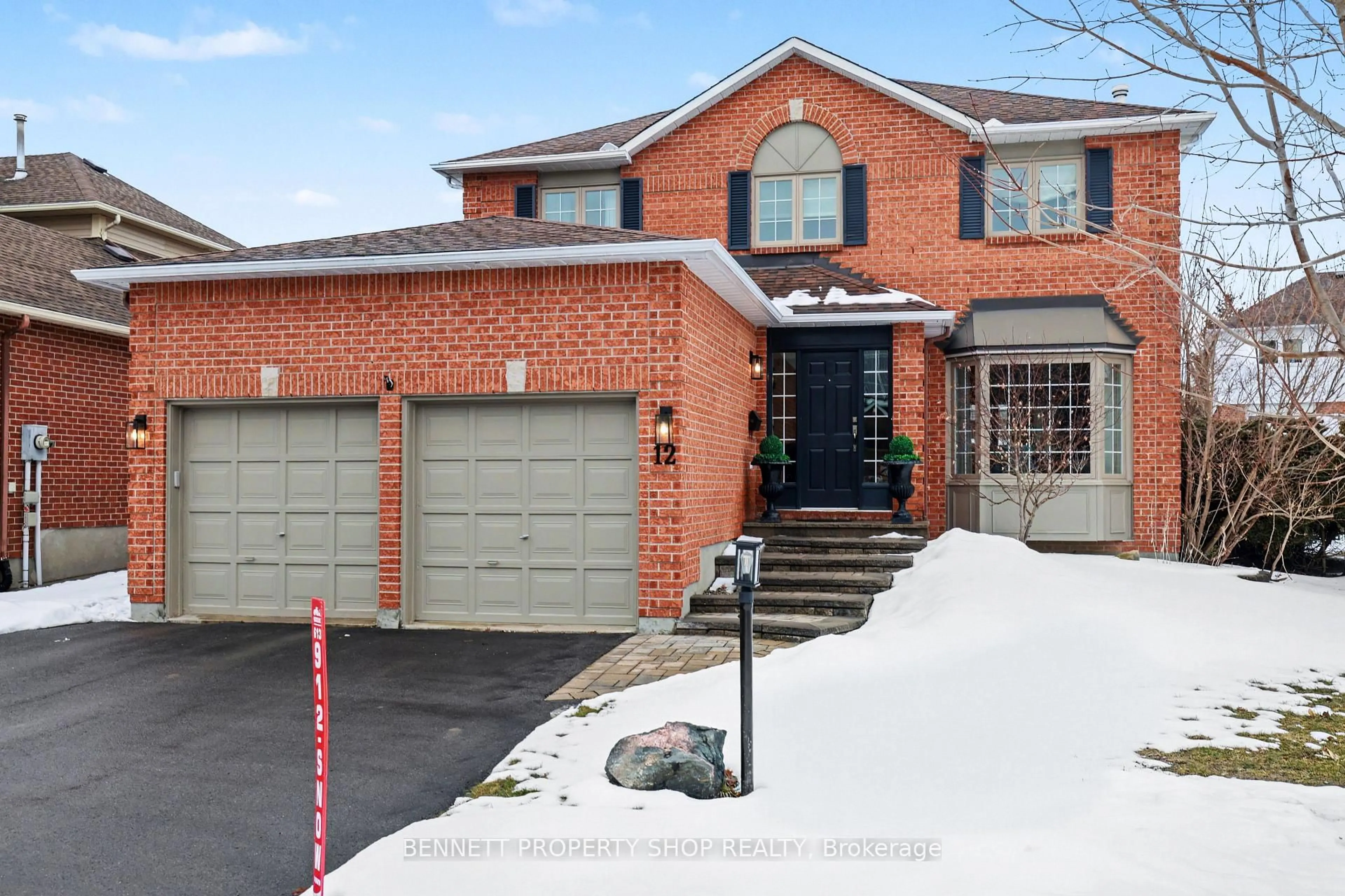 Home with brick exterior material, street for 12 Sherk Cres, Ottawa Ontario K2K 2L4