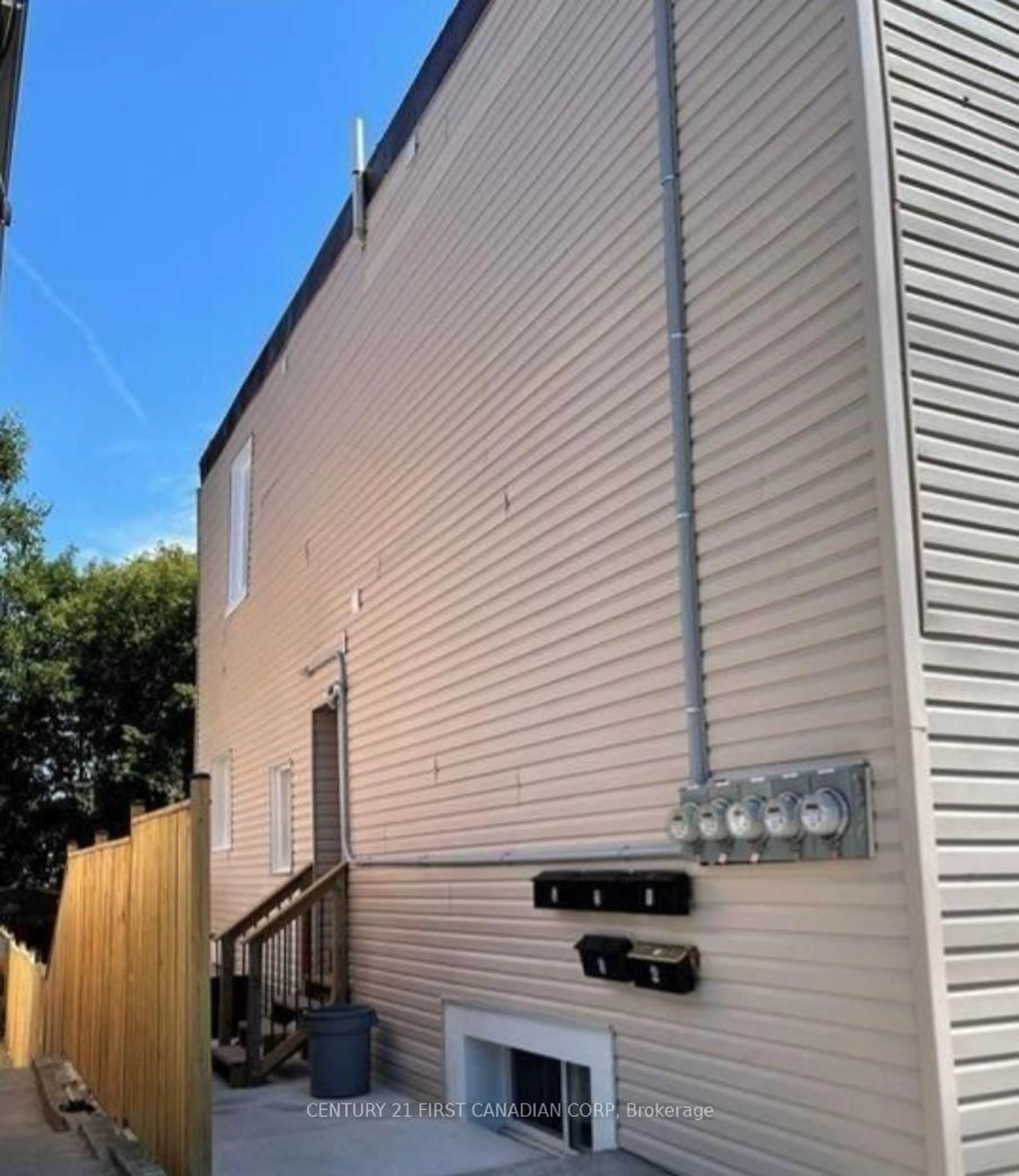 Home with vinyl exterior material, street for 20 Adelaide St, London South Ontario N5Z 3J8