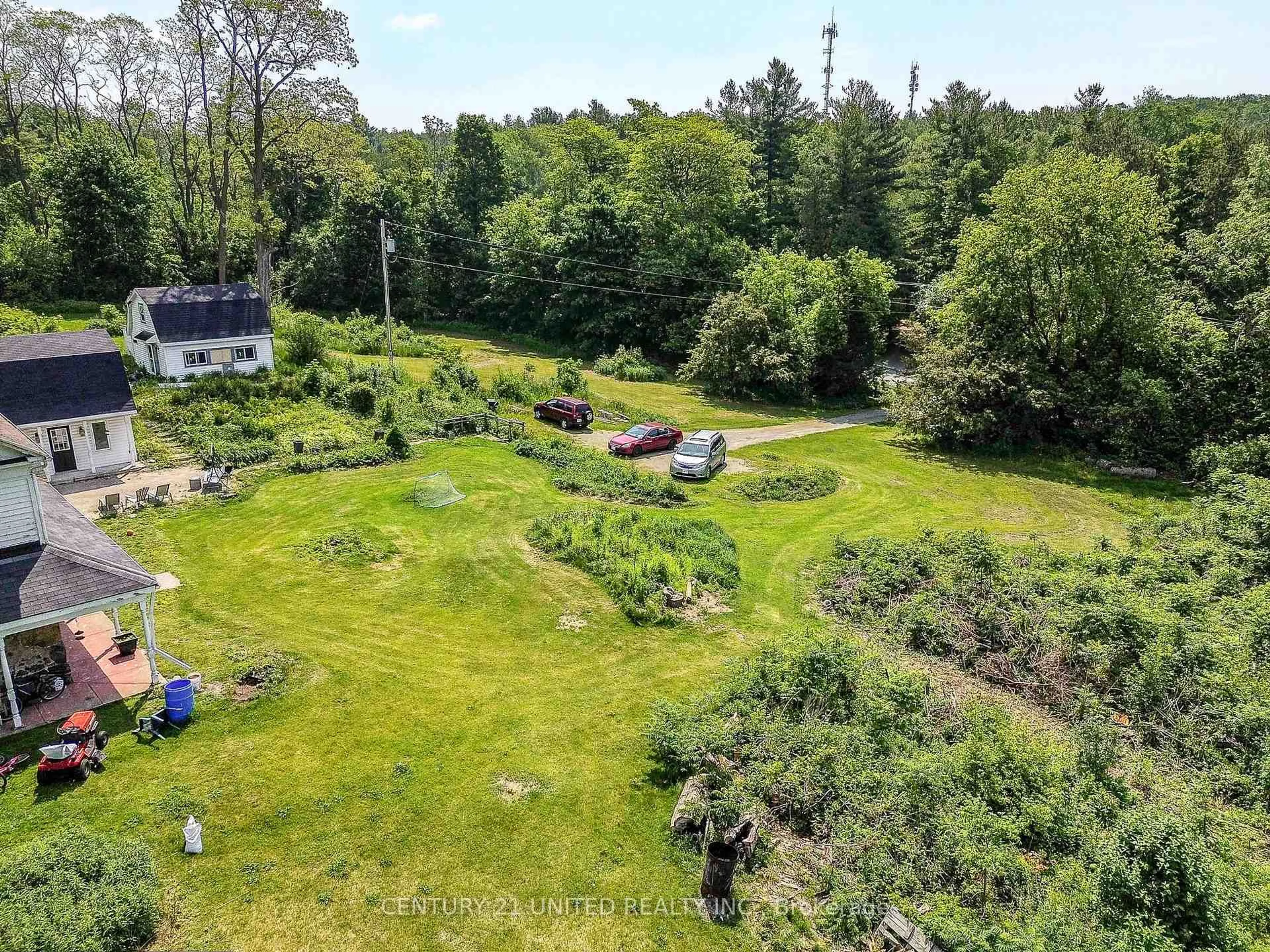 A pic from outside/outdoor area/front of a property/back of a property/a pic from drone, forest/trees view for 9340 Danforth Rd, Cobourg Ontario K9A 4J8