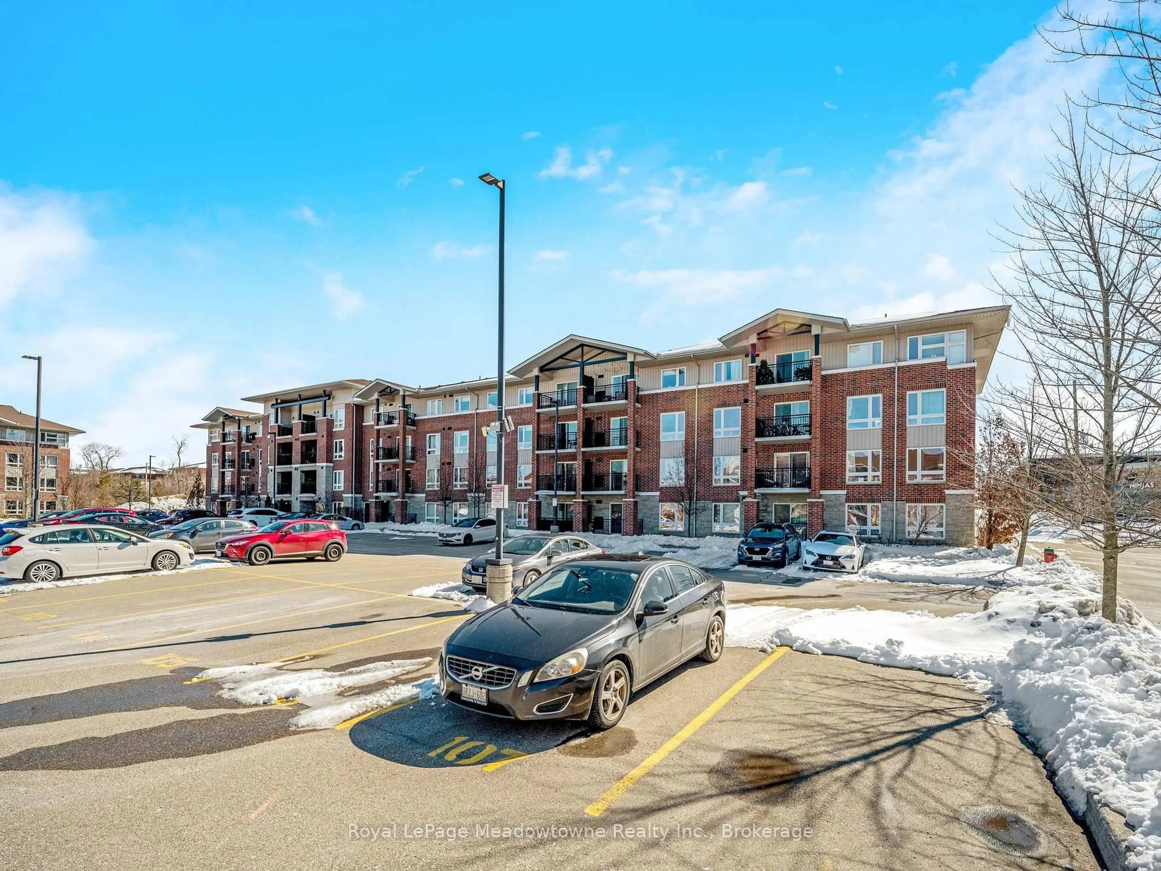 A pic from outside/outdoor area/front of a property/back of a property/a pic from drone, unknown for 43 Goodwin Dr #307, Guelph Ontario N1L 0E8