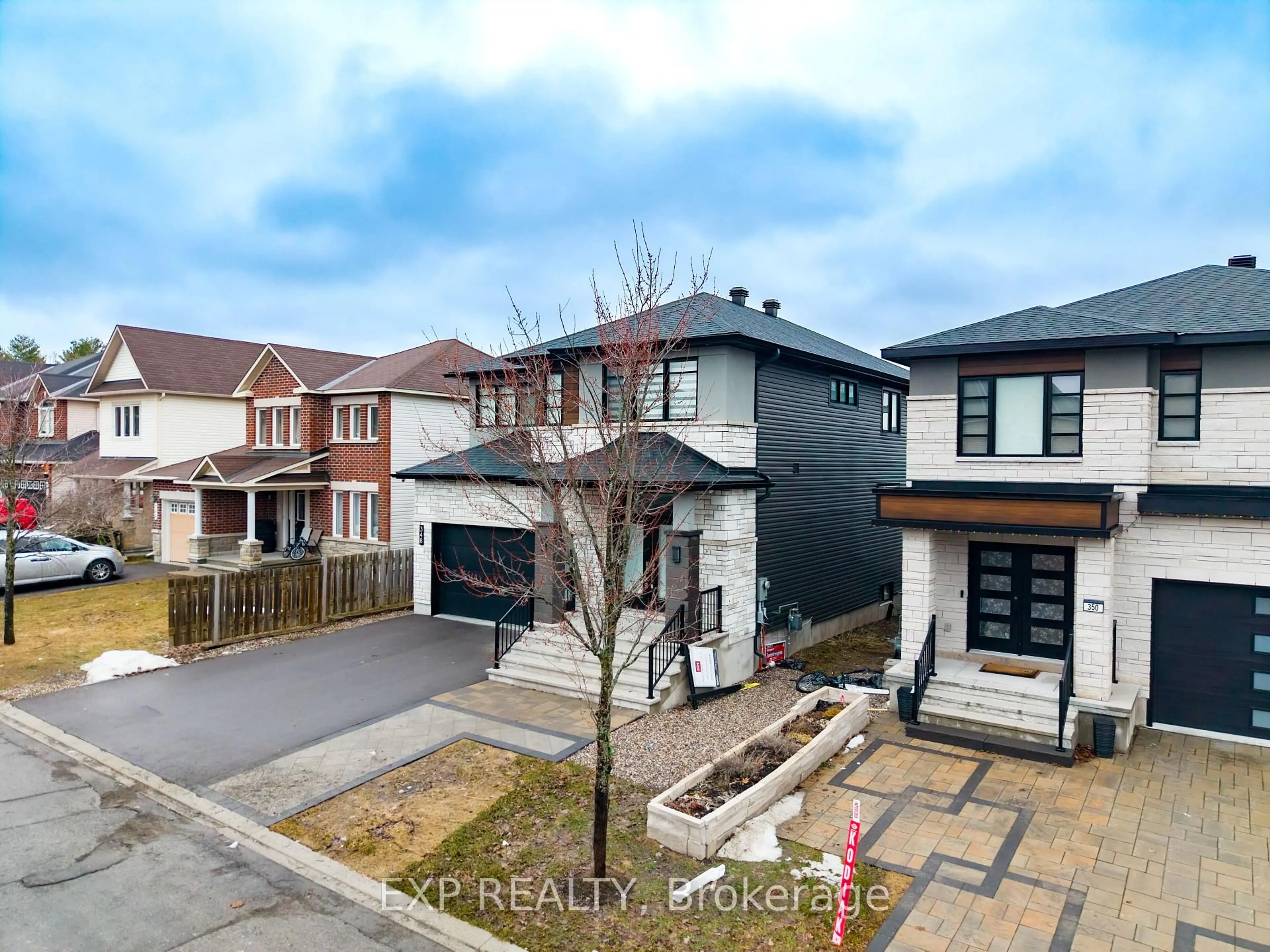 A pic from outside/outdoor area/front of a property/back of a property/a pic from drone, street for 348 Abbeydale Circ, Ottawa Ontario K2K 0E9