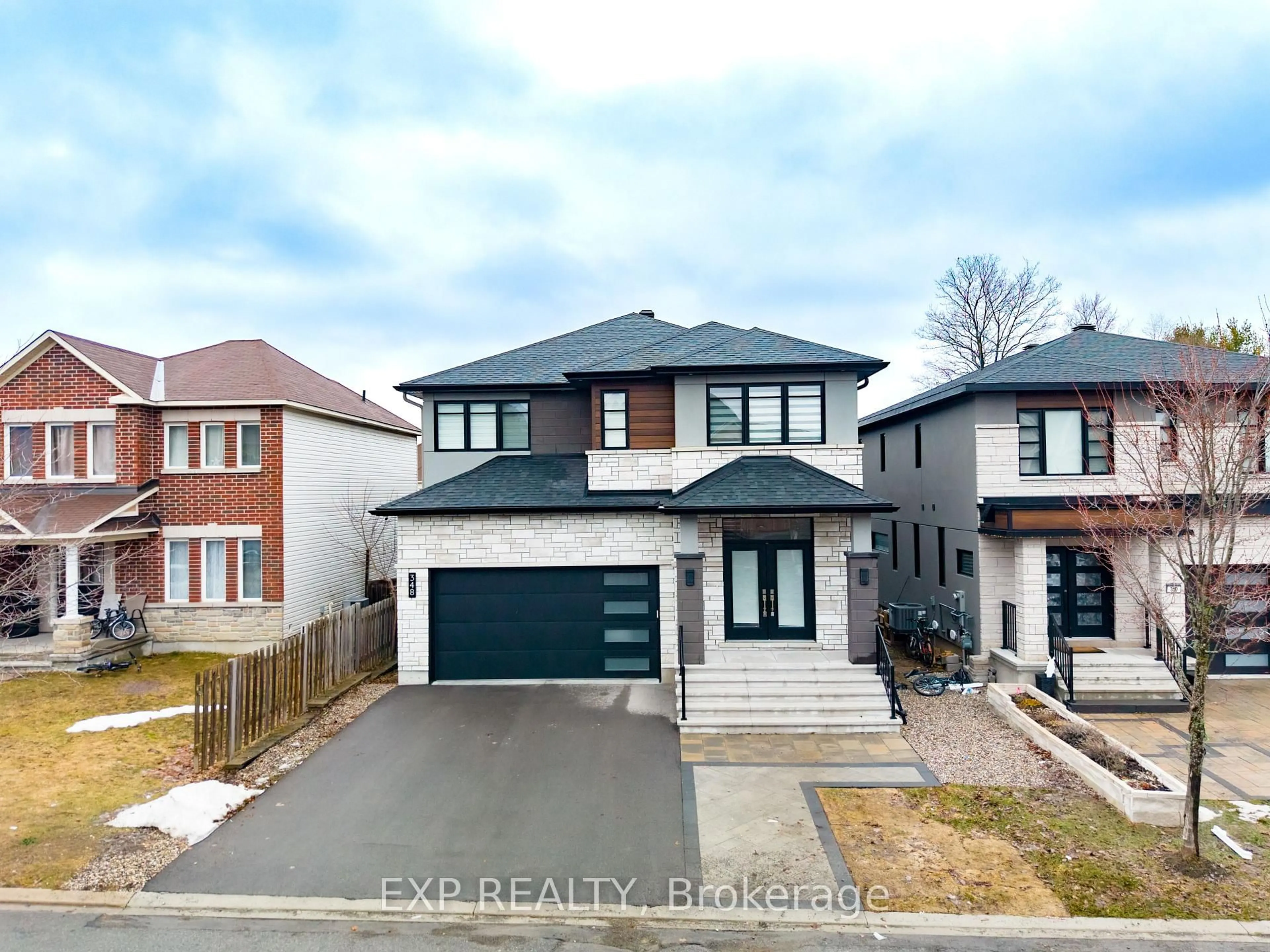 Home with brick exterior material, street for 348 Abbeydale Circ, Ottawa Ontario K2K 0E9