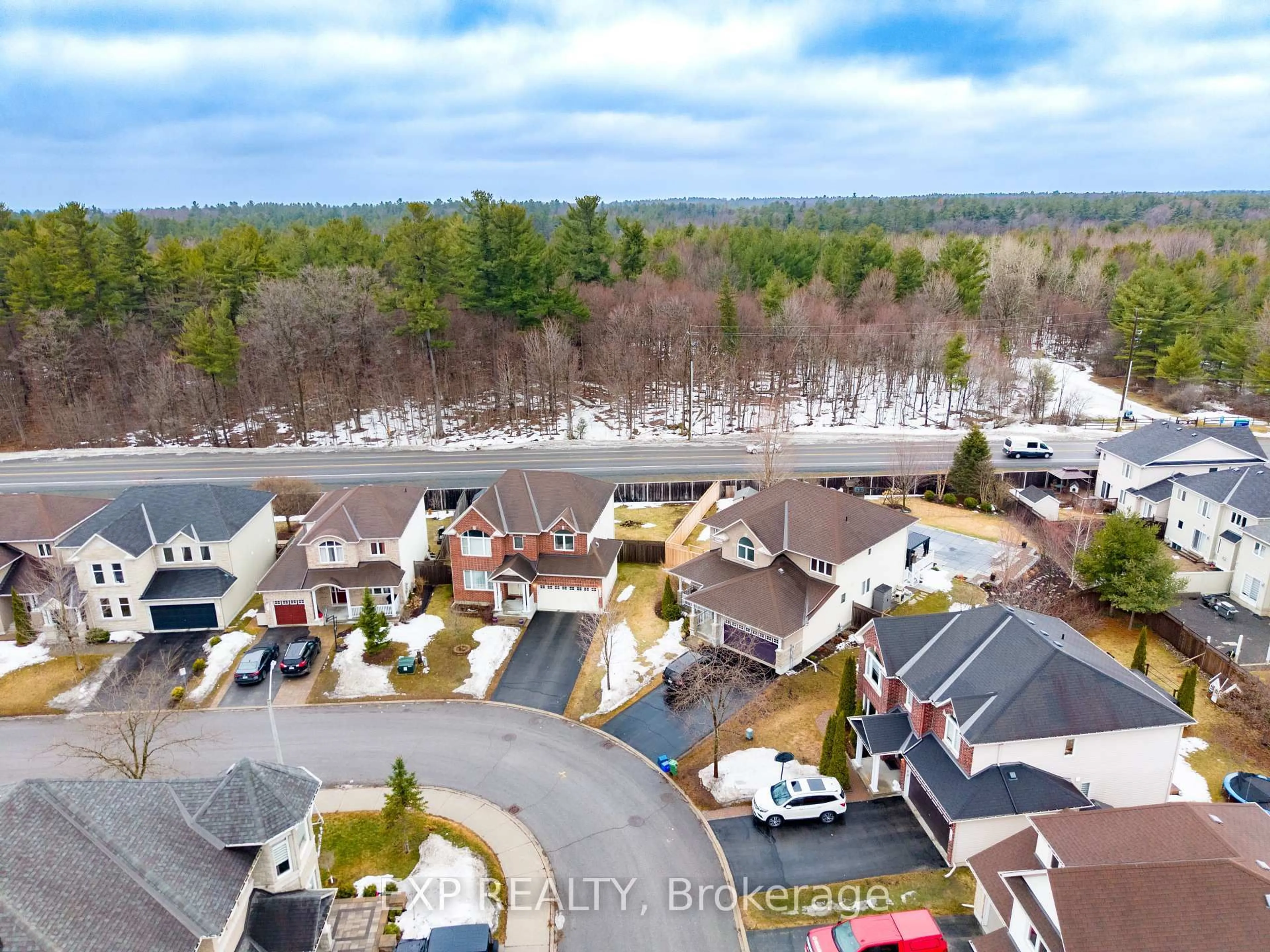 A pic from outside/outdoor area/front of a property/back of a property/a pic from drone, unknown for 348 Abbeydale Circ, Ottawa Ontario K2K 0E9