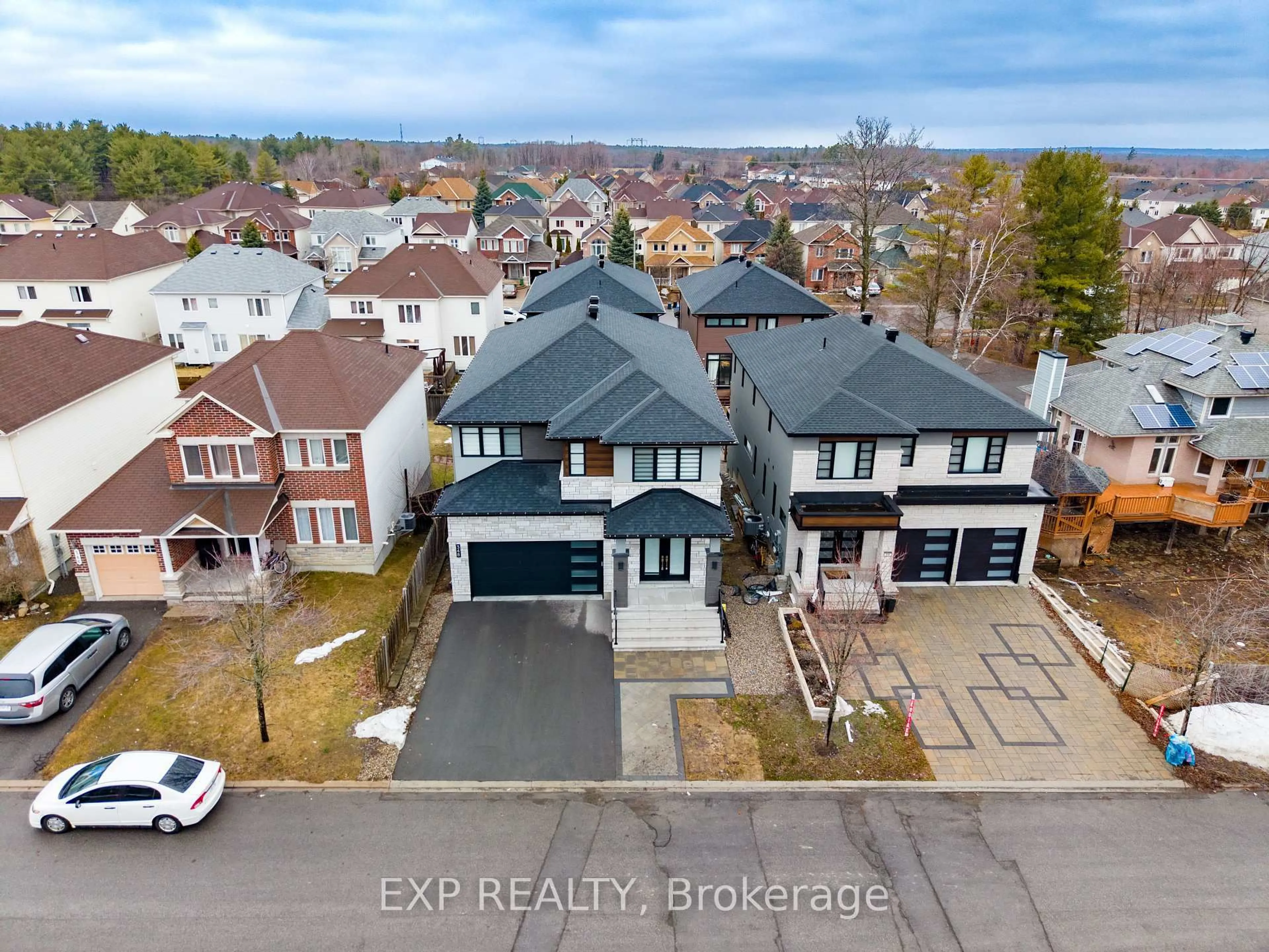 A pic from outside/outdoor area/front of a property/back of a property/a pic from drone, street for 348 Abbeydale Circ, Ottawa Ontario K2K 0E9