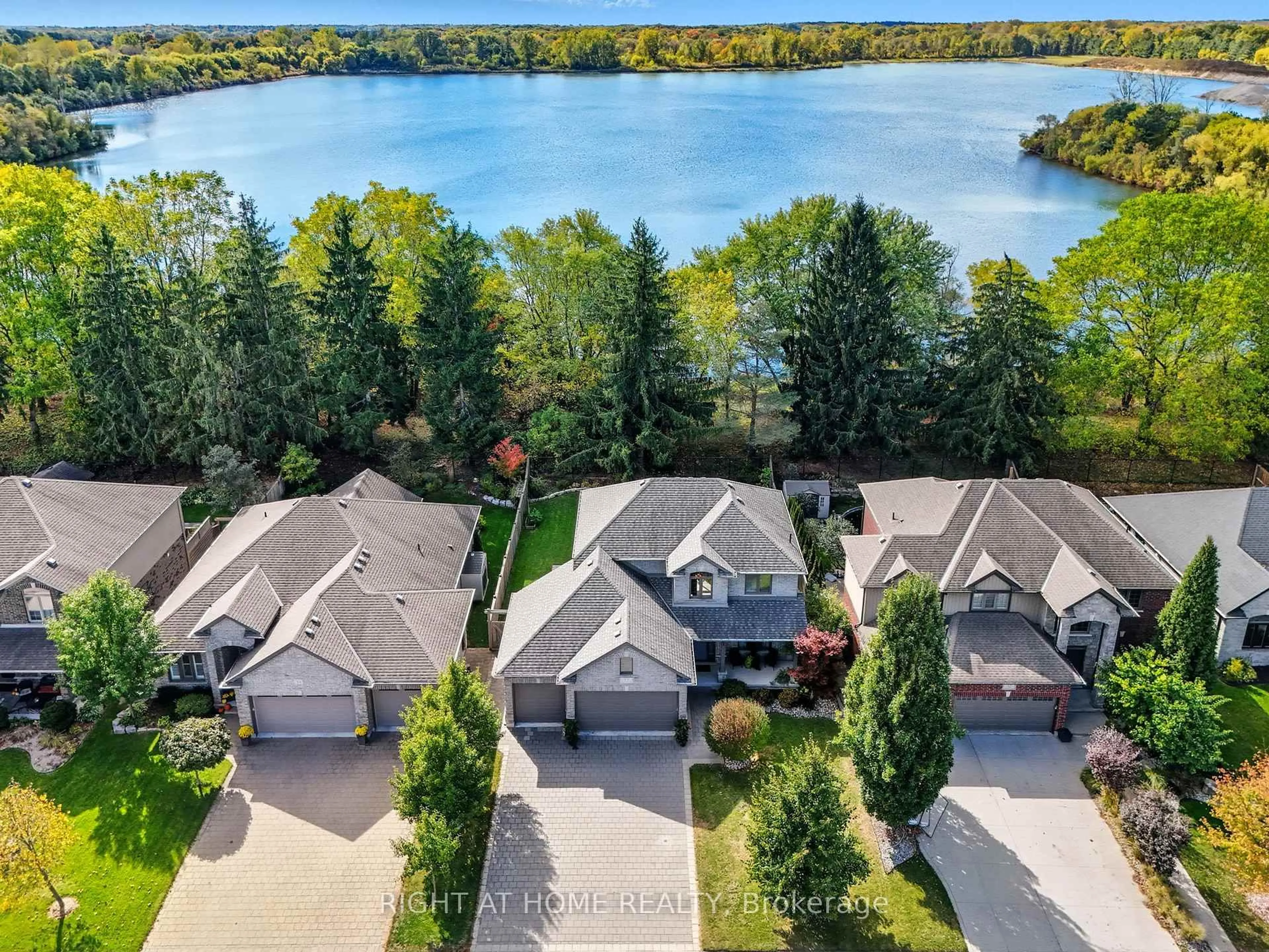 A pic from outside/outdoor area/front of a property/back of a property/a pic from drone, water/lake/river/ocean view for 35 Caverhill Cres, Middlesex Centre Ontario N0L 1R0
