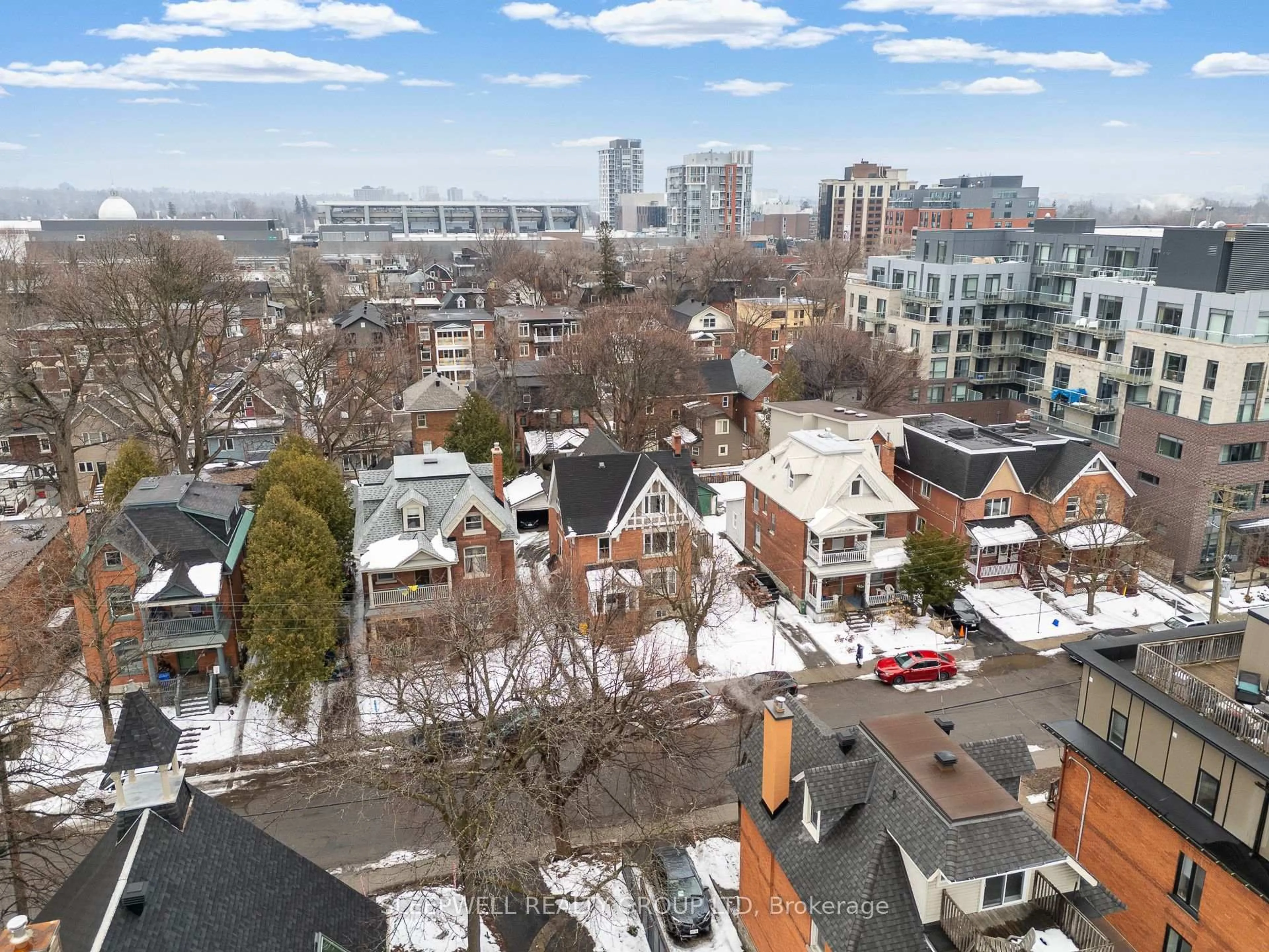 A pic from outside/outdoor area/front of a property/back of a property/a pic from drone, city buildings view from balcony for 84 Fourth Ave, Ottawa Ontario K1S 2L2