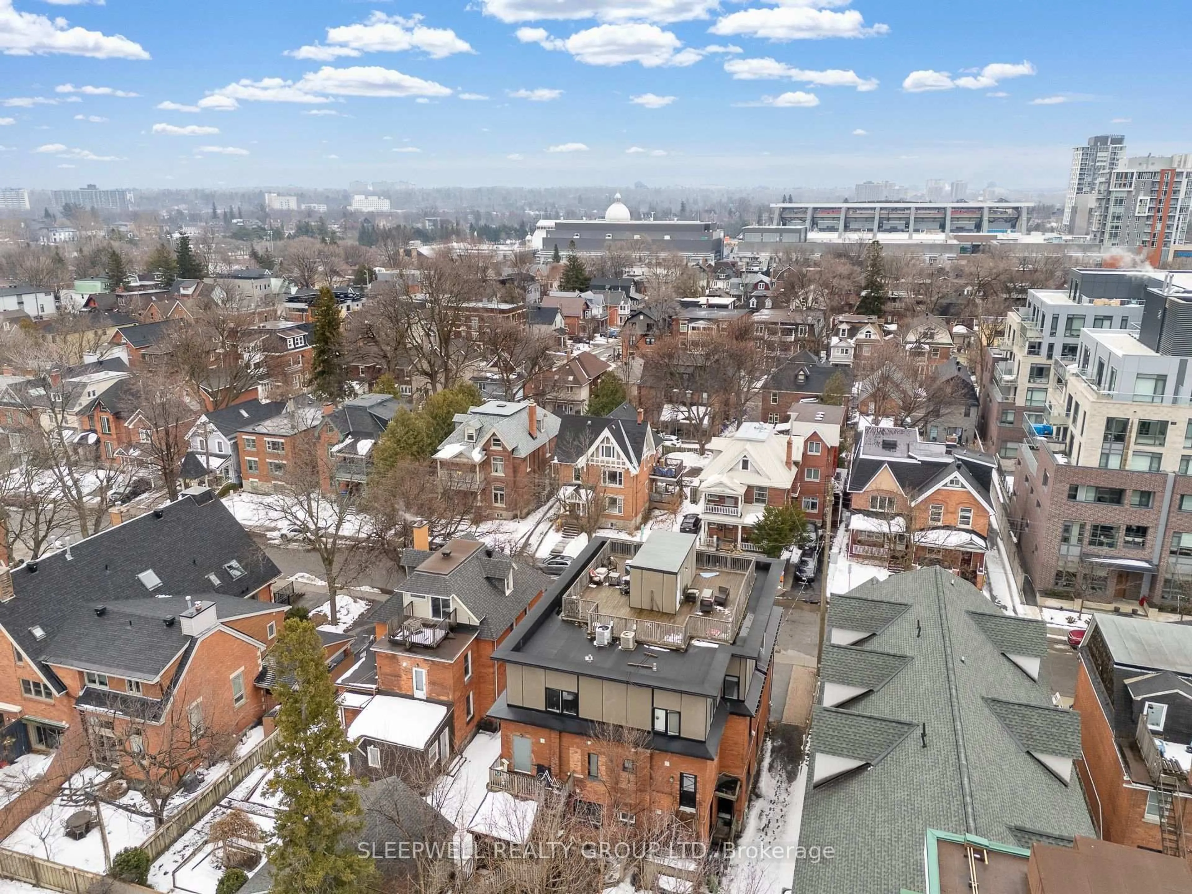 A pic from outside/outdoor area/front of a property/back of a property/a pic from drone, city buildings view from balcony for 84 Fourth Ave, Ottawa Ontario K1S 2L2