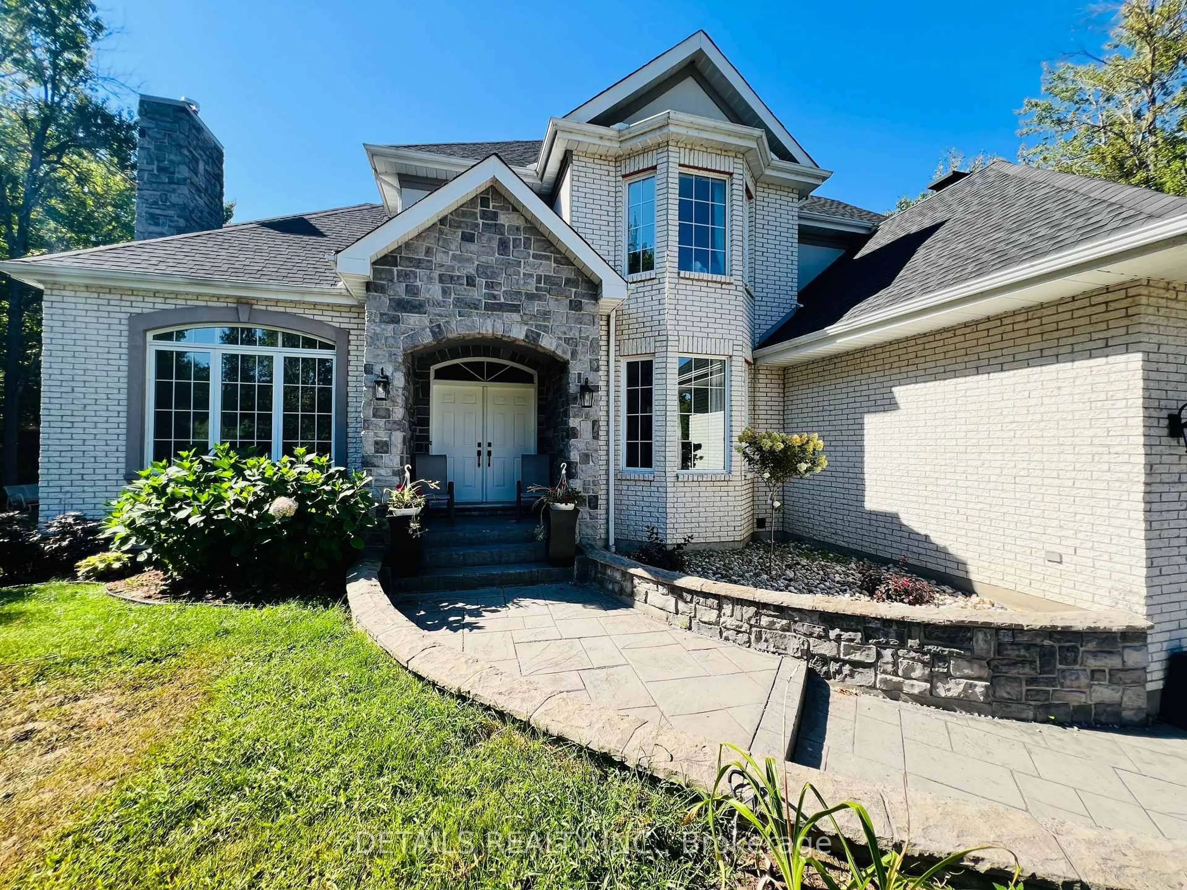 Home with brick exterior material, street for 461 John Aselford Dr, Ottawa Ontario K2W 1A8