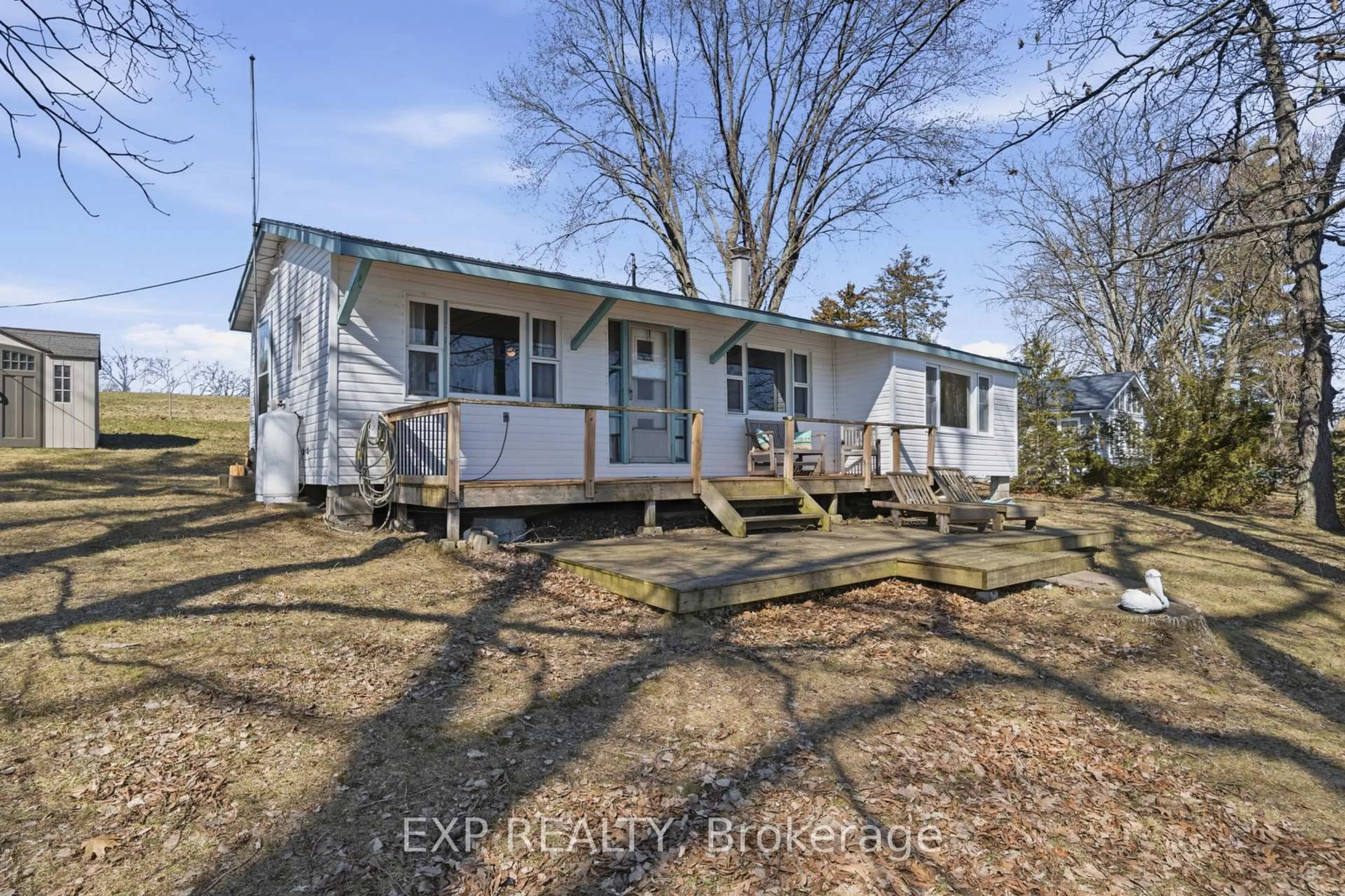 A pic from outside/outdoor area/front of a property/back of a property/a pic from drone, water/lake/river/ocean view for 32 Quinte View Rd, Bath Ontario K0H 1G0