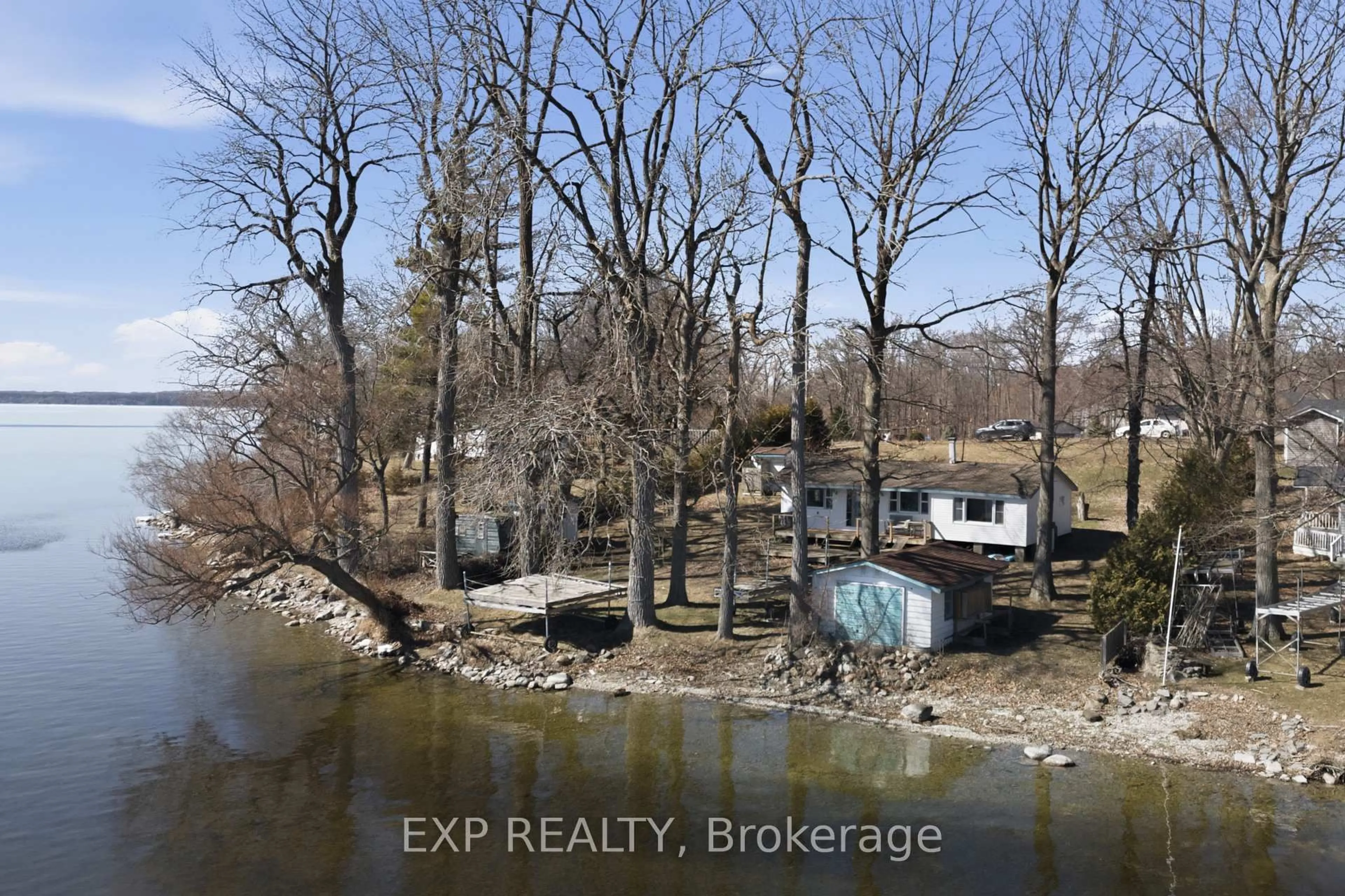A pic from outside/outdoor area/front of a property/back of a property/a pic from drone, water/lake/river/ocean view for 32 Quinte View Rd, Bath Ontario K0H 1G0