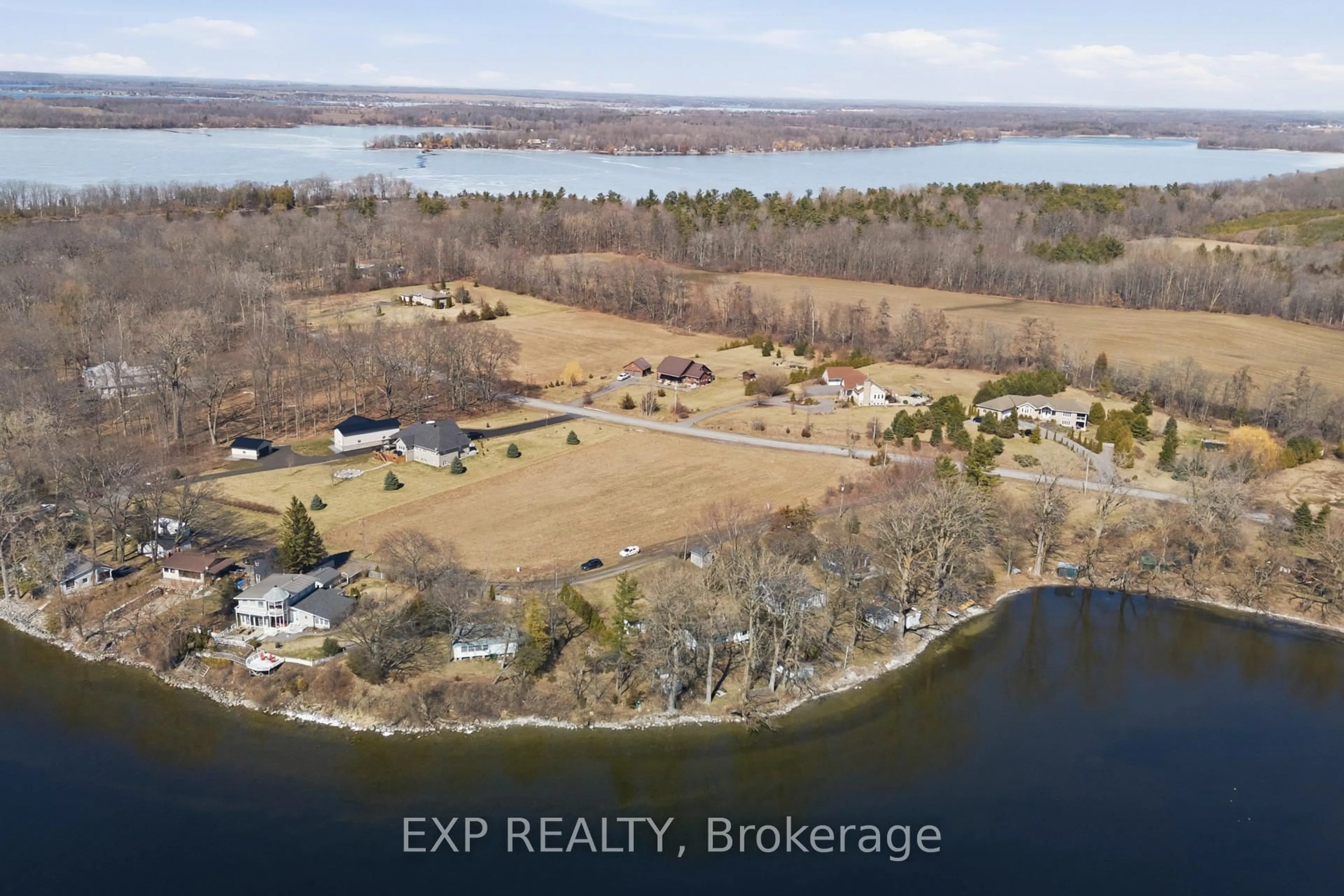 A pic from outside/outdoor area/front of a property/back of a property/a pic from drone, water/lake/river/ocean view for 32 Quinte View Rd, Bath Ontario K0H 1G0