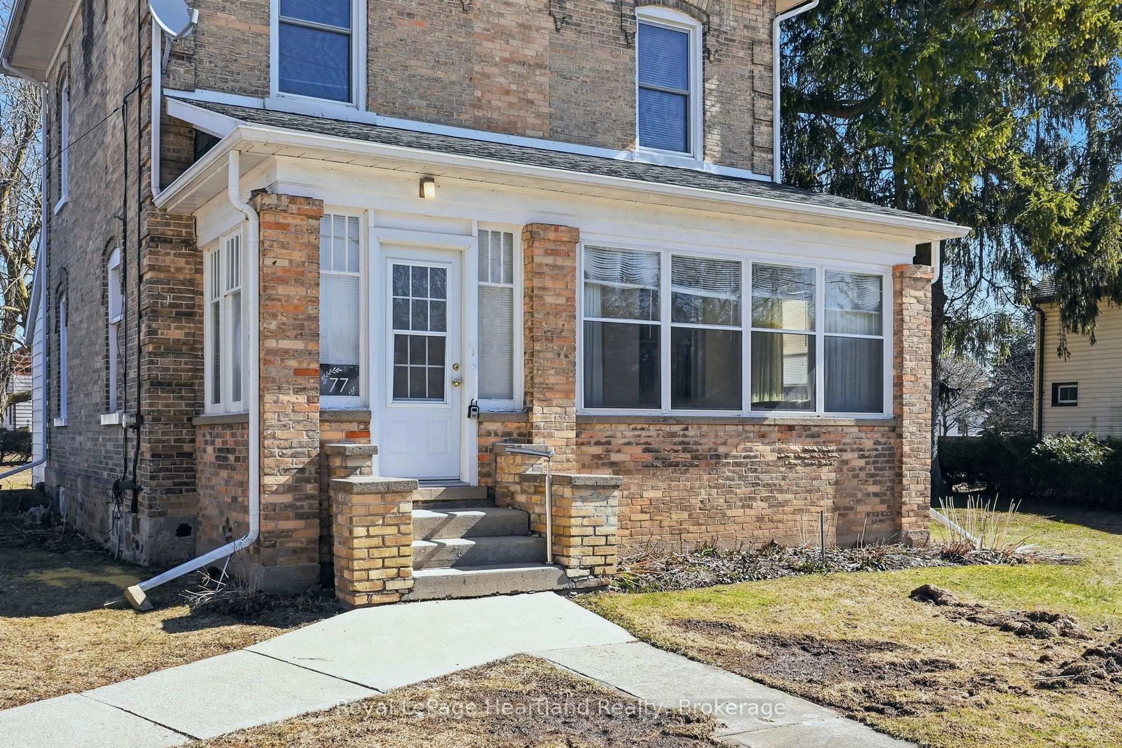 Home with brick exterior material, street for 77 King St, Minto Ontario N0G 1Z0