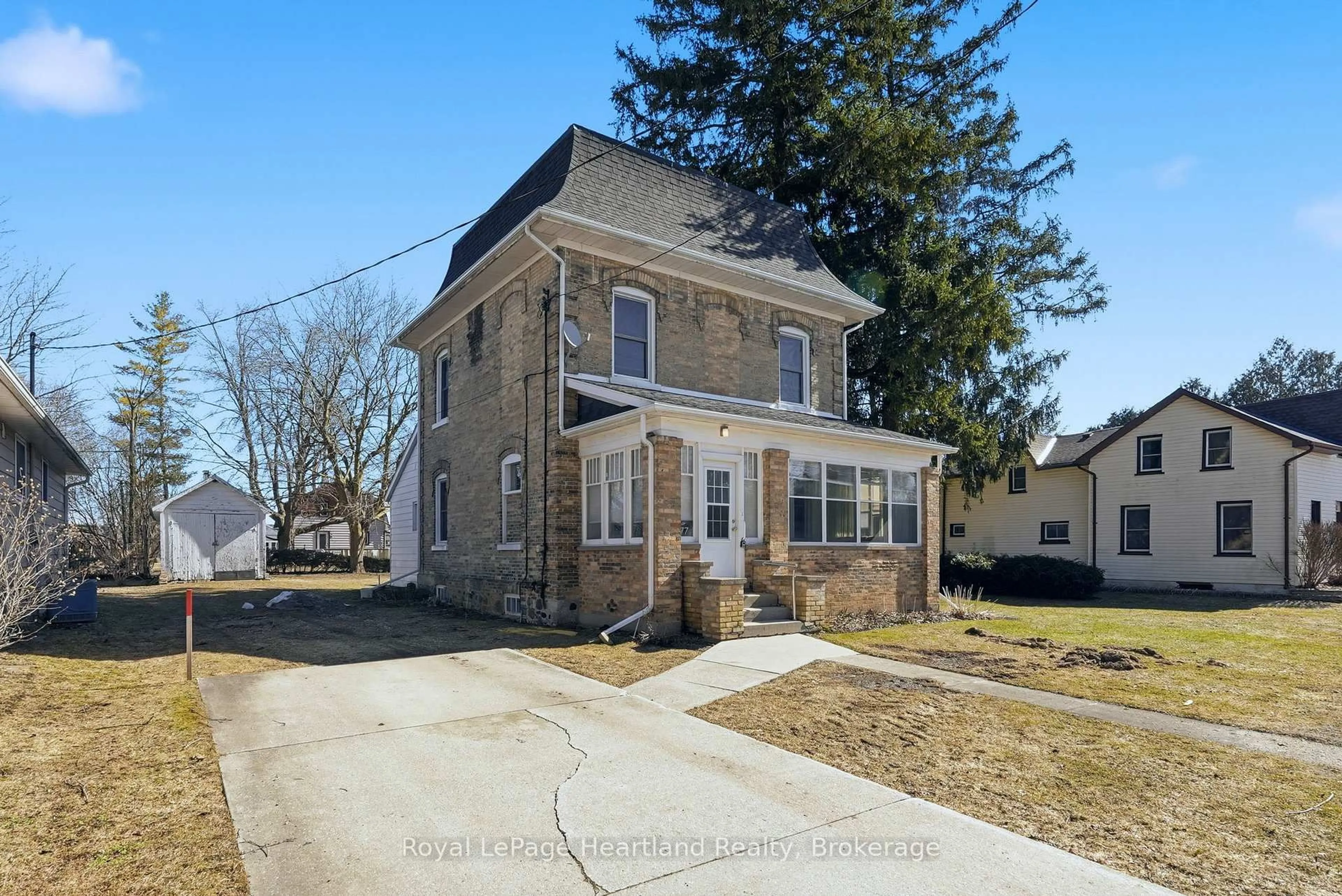 Home with brick exterior material, street for 77 King St, Minto Ontario N0G 1Z0