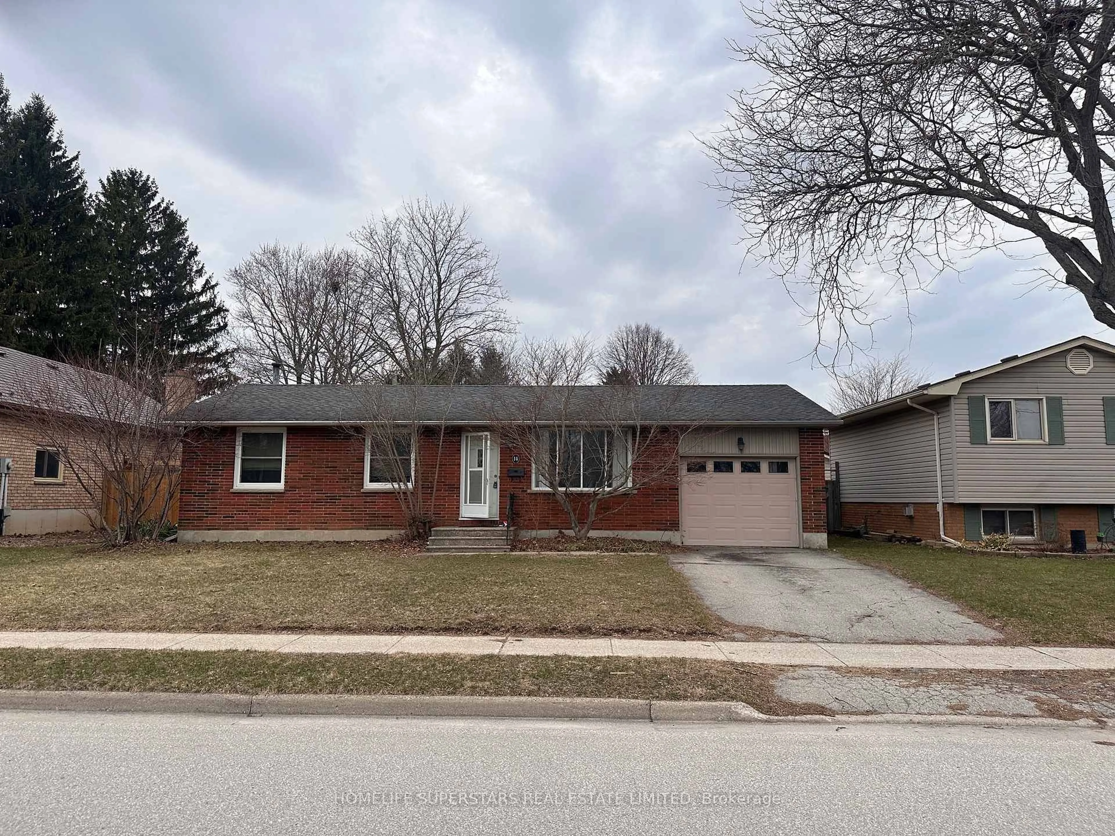 Home with brick exterior material, street for 14 Locke Ave, St. Thomas Ontario N5P 3X2