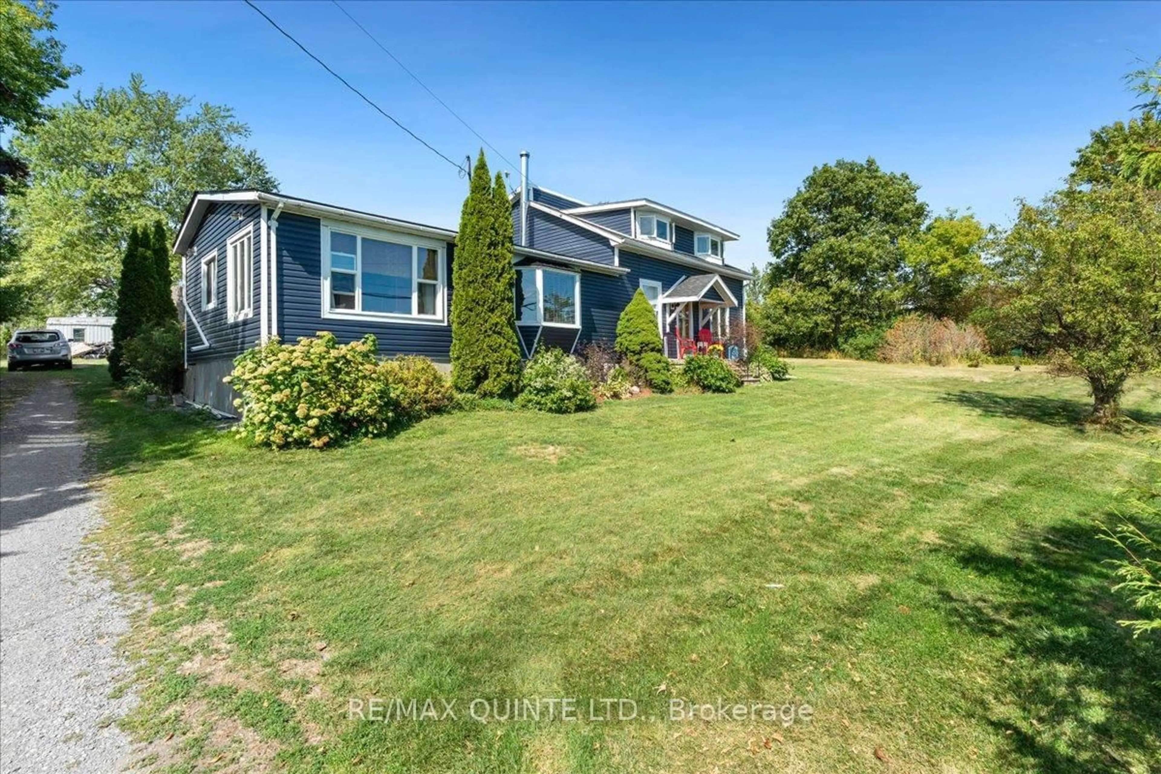 A pic from outside/outdoor area/front of a property/back of a property/a pic from drone, street for 7763 Loyalist Pkwy, Bath Ontario K0H 1G0