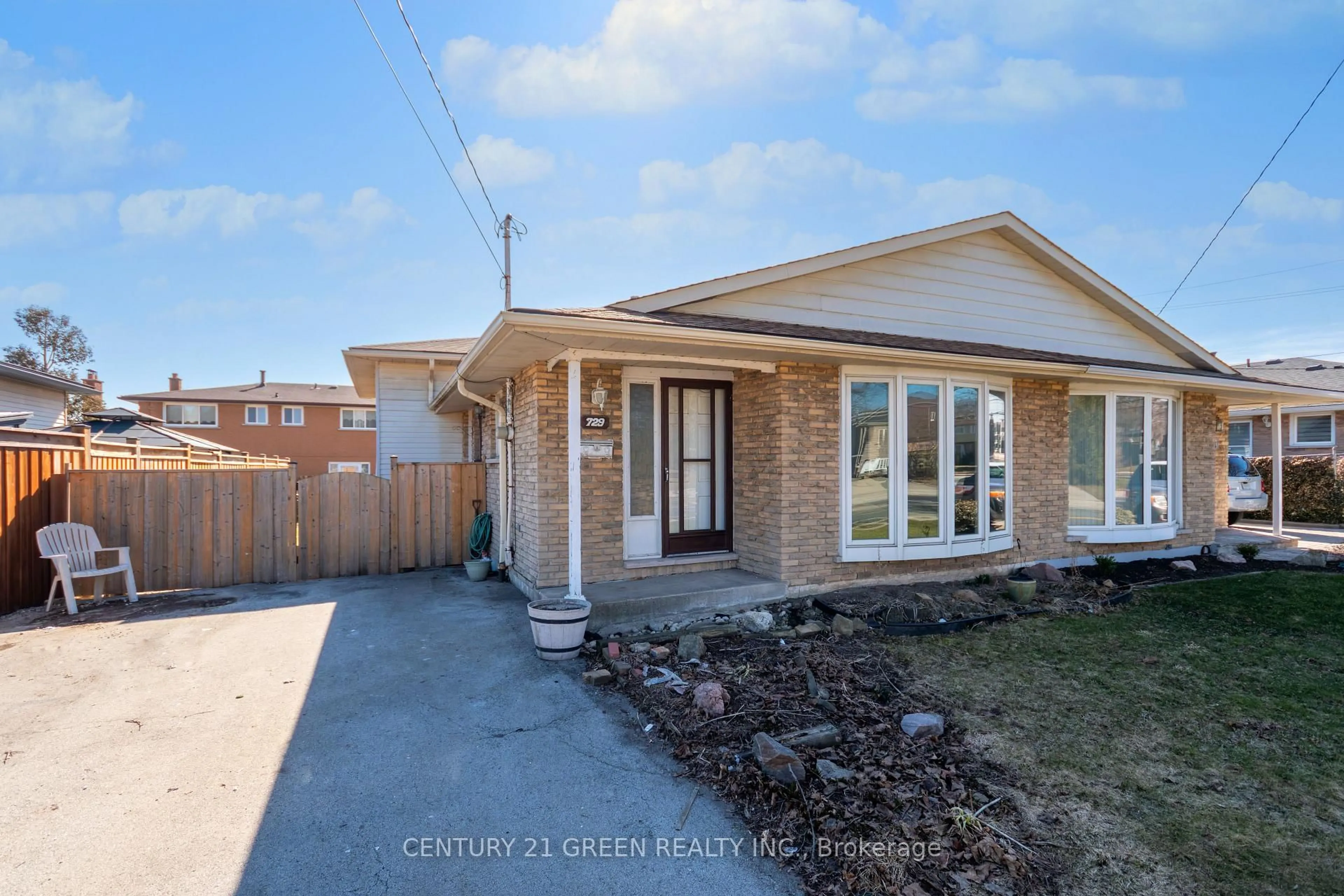 Home with brick exterior material, street for 729 West 5th St, Hamilton Ontario L9C 3R3