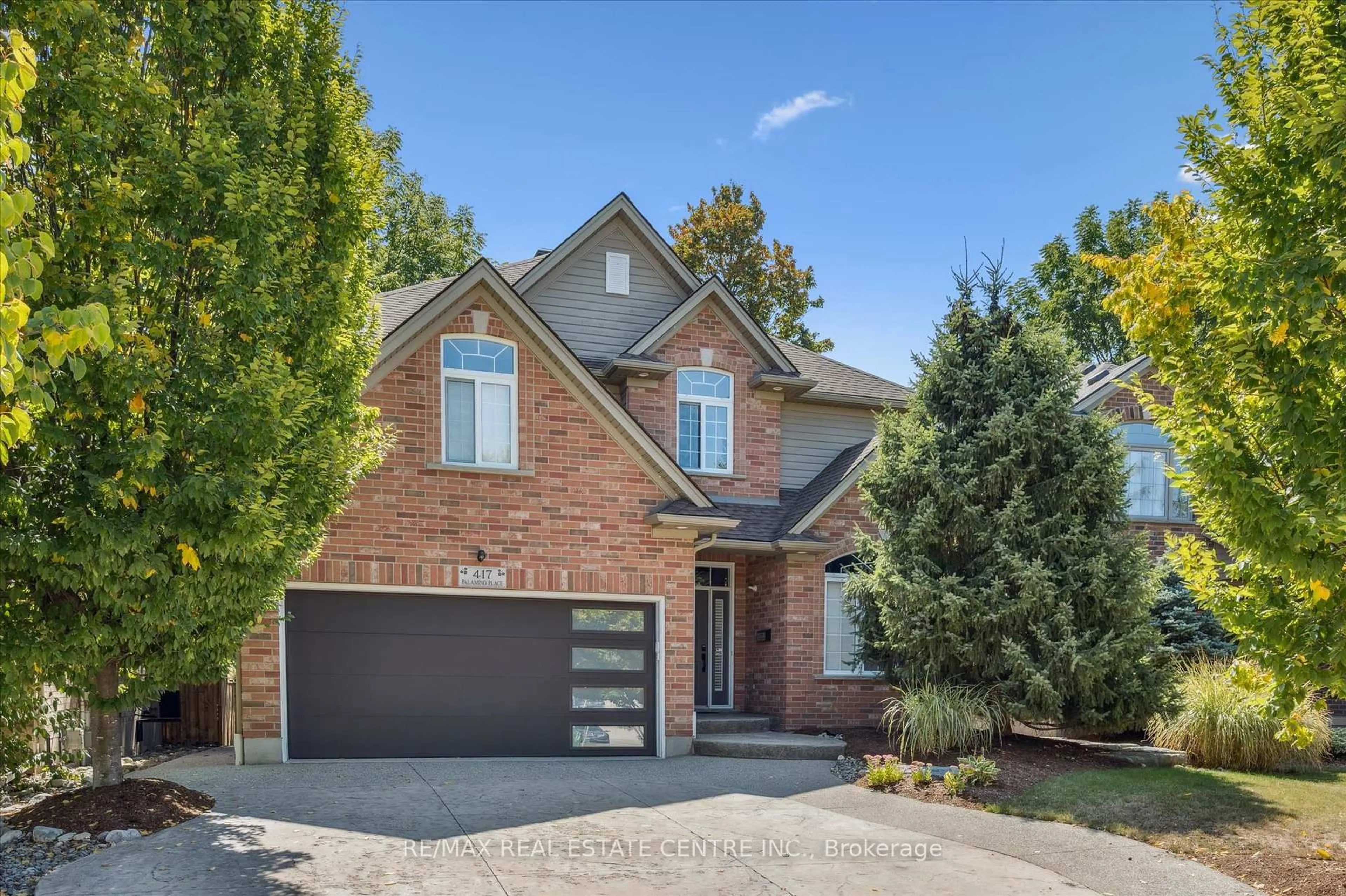 Home with brick exterior material, street for 417 Palamino Pl, Waterloo Ontario N2K 4K5