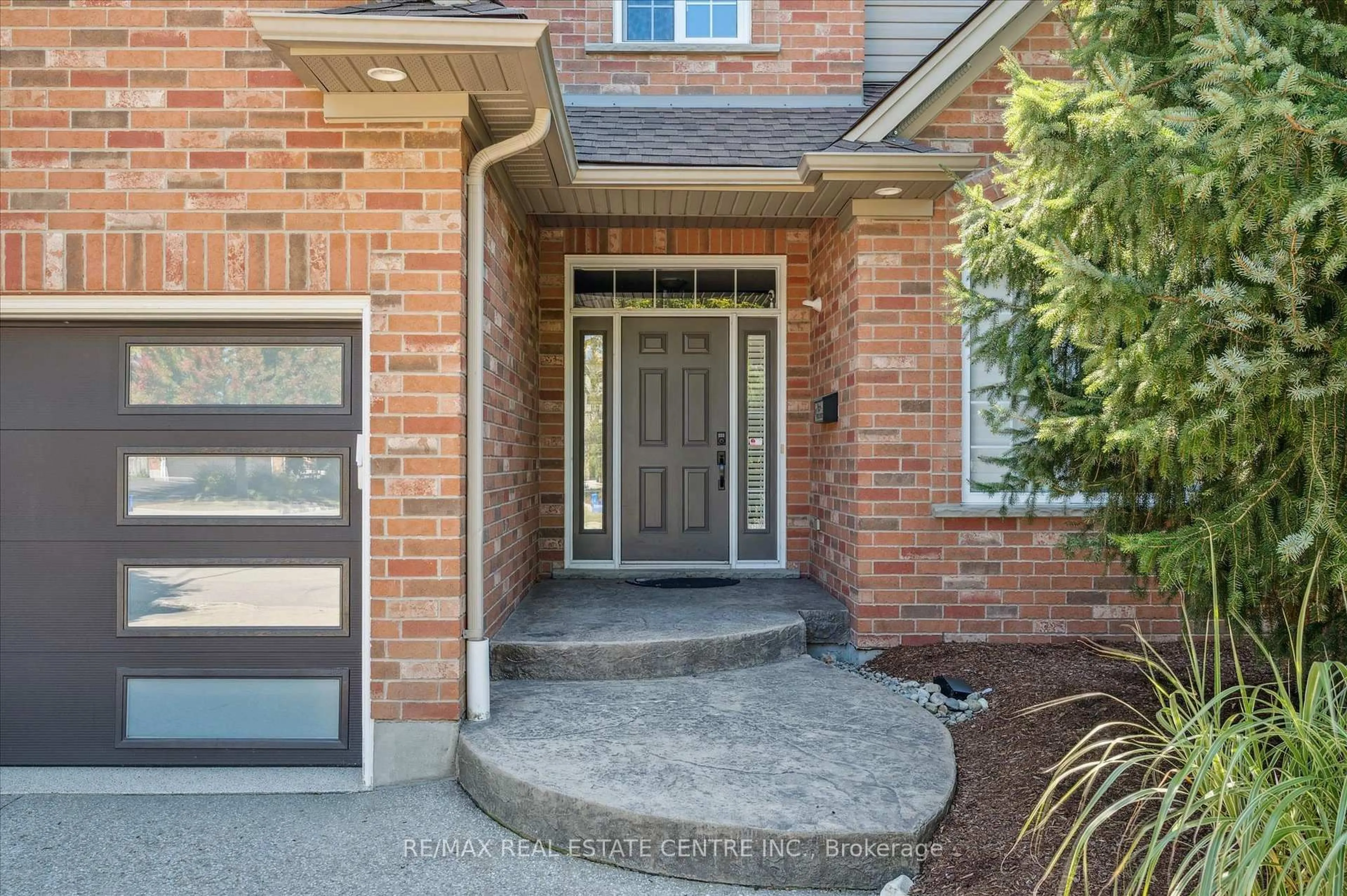 Home with brick exterior material, street for 417 Palamino Pl, Waterloo Ontario N2K 4K5