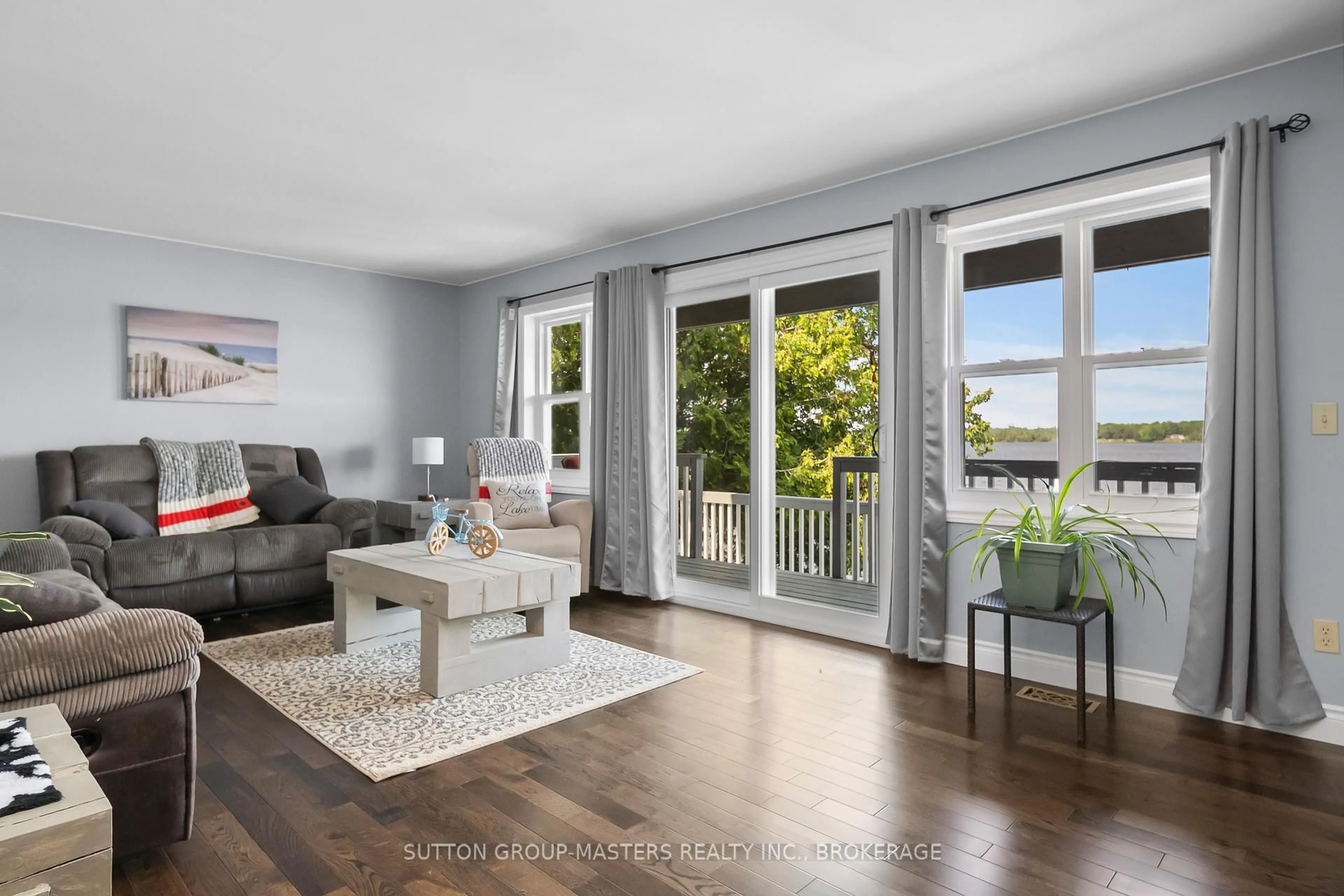 Living room with furniture, wood/laminate floor for 20B Oak Lane, Tamworth Ontario K0K 3G0