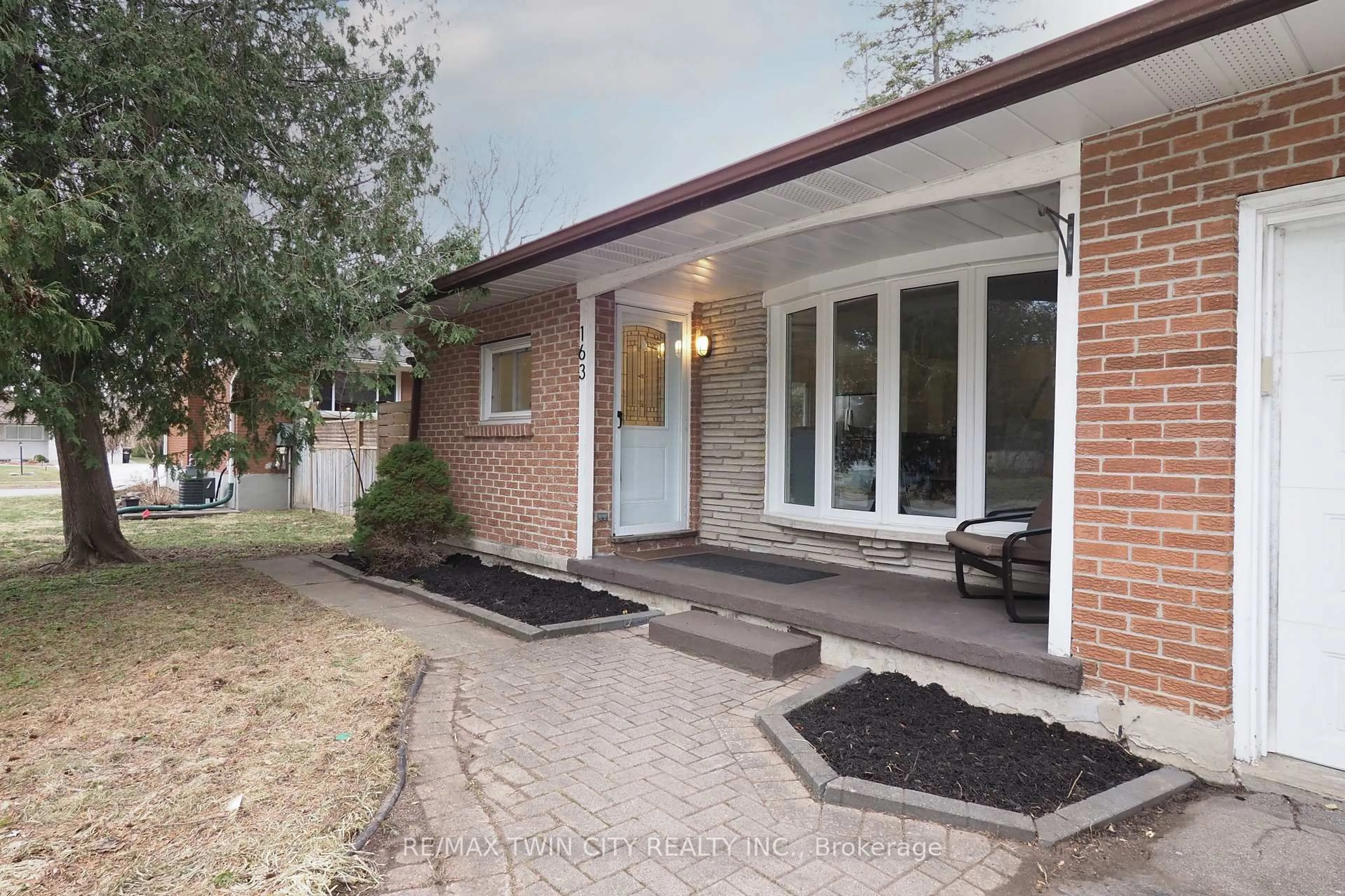 Home with brick exterior material, street for 163 Pinegrove Cres, Waterloo Ontario N2L 4T9
