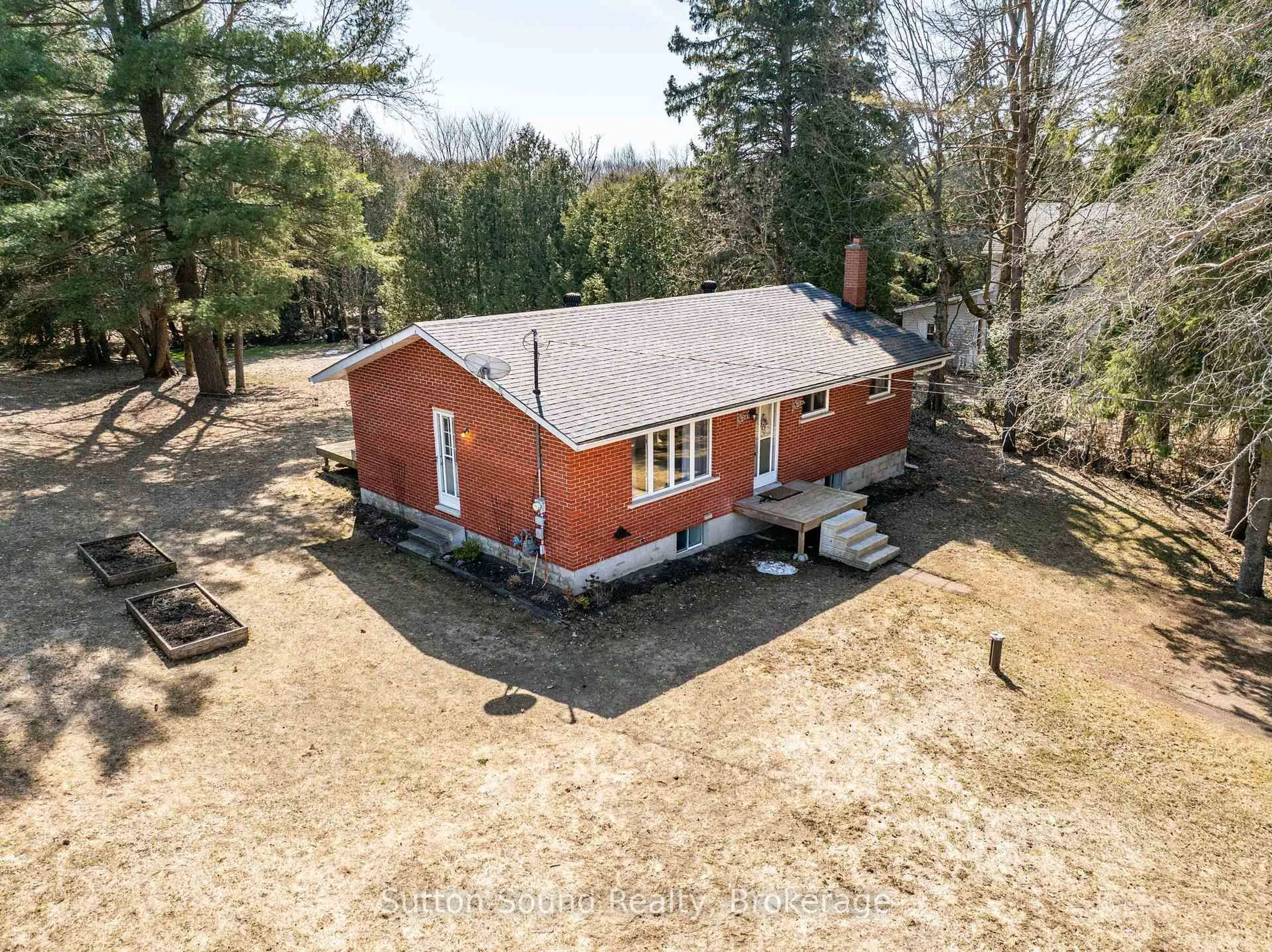 A pic from outside/outdoor area/front of a property/back of a property/a pic from drone, building for 102710 Grey Road 18, Georgian Bluffs Ontario N4K 5N6