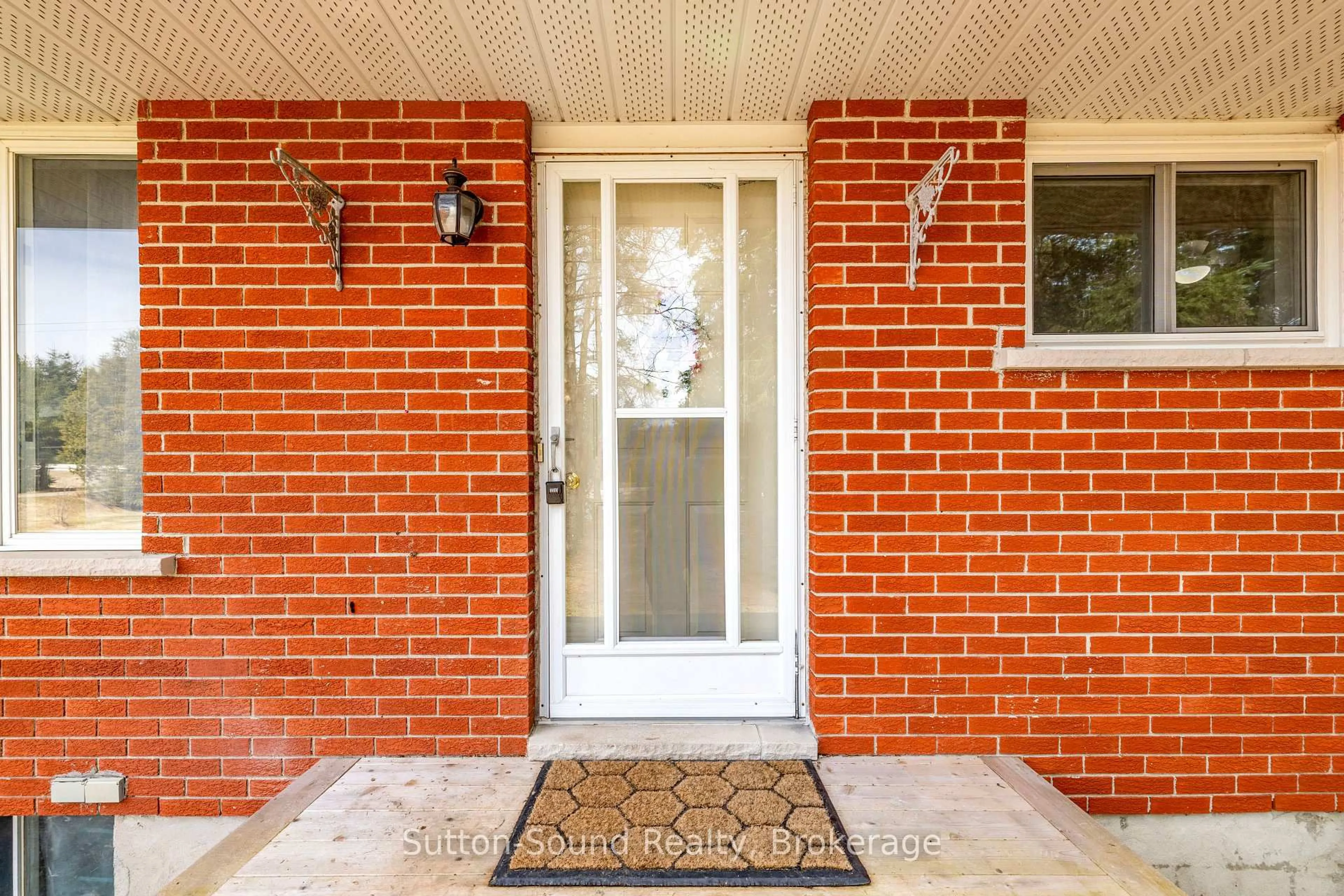 Home with brick exterior material, street for 102710 Grey Road 18, Georgian Bluffs Ontario N4K 5N6