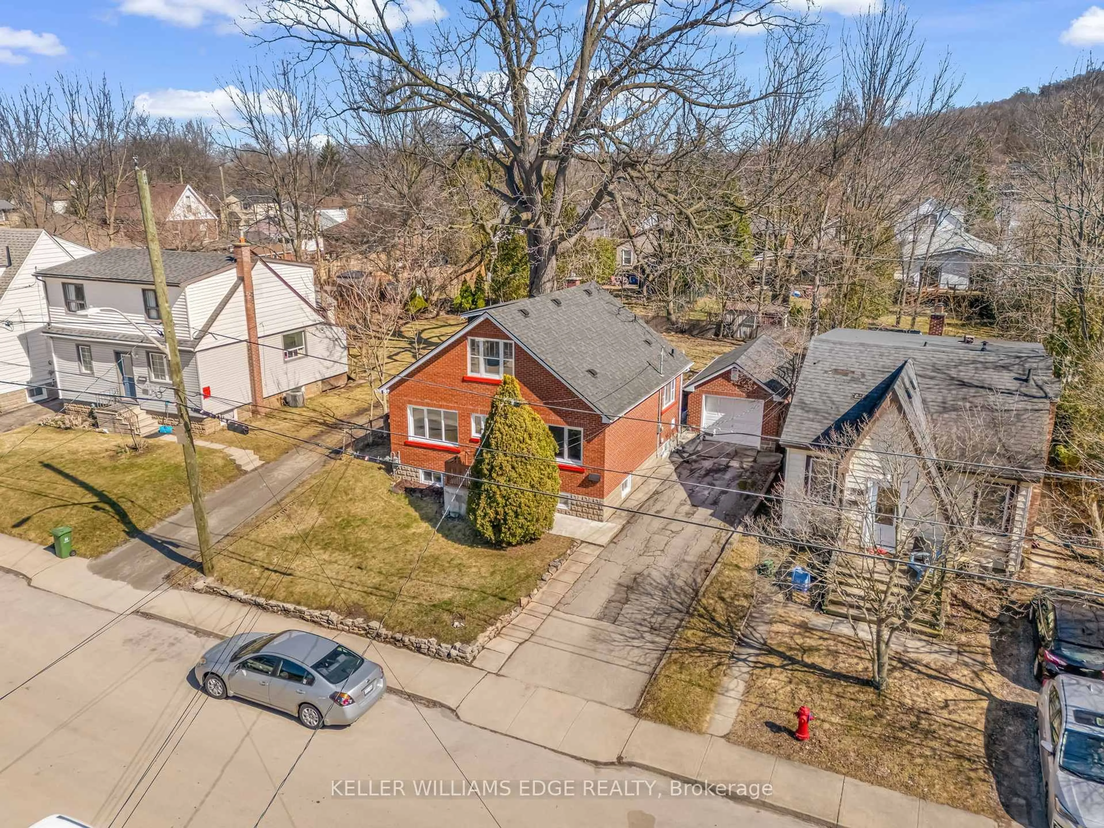 A pic from outside/outdoor area/front of a property/back of a property/a pic from drone, street for 23 Clifford St, Hamilton Ontario L8S 2Z7