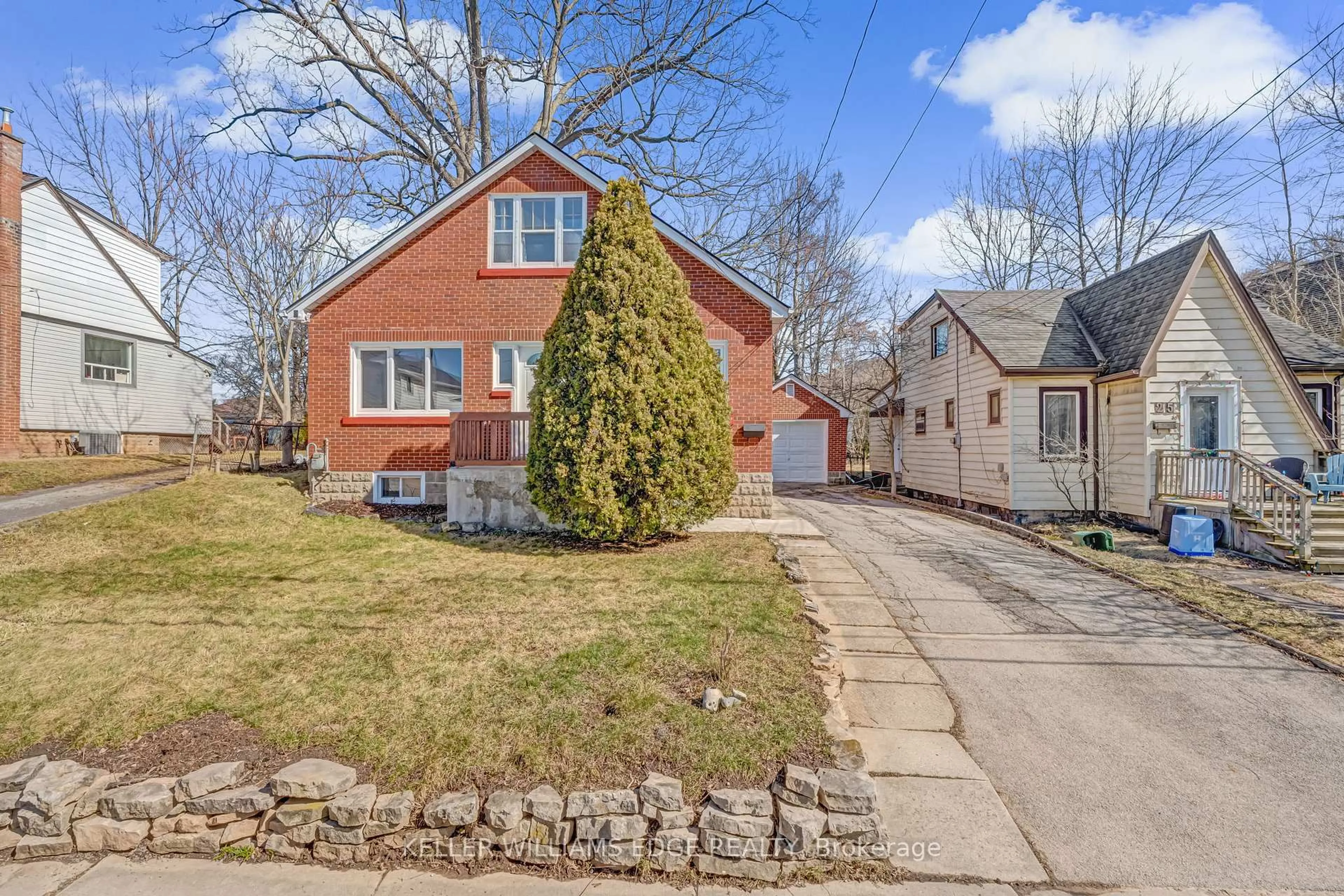 Home with brick exterior material, street for 23 Clifford St, Hamilton Ontario L8S 2Z7