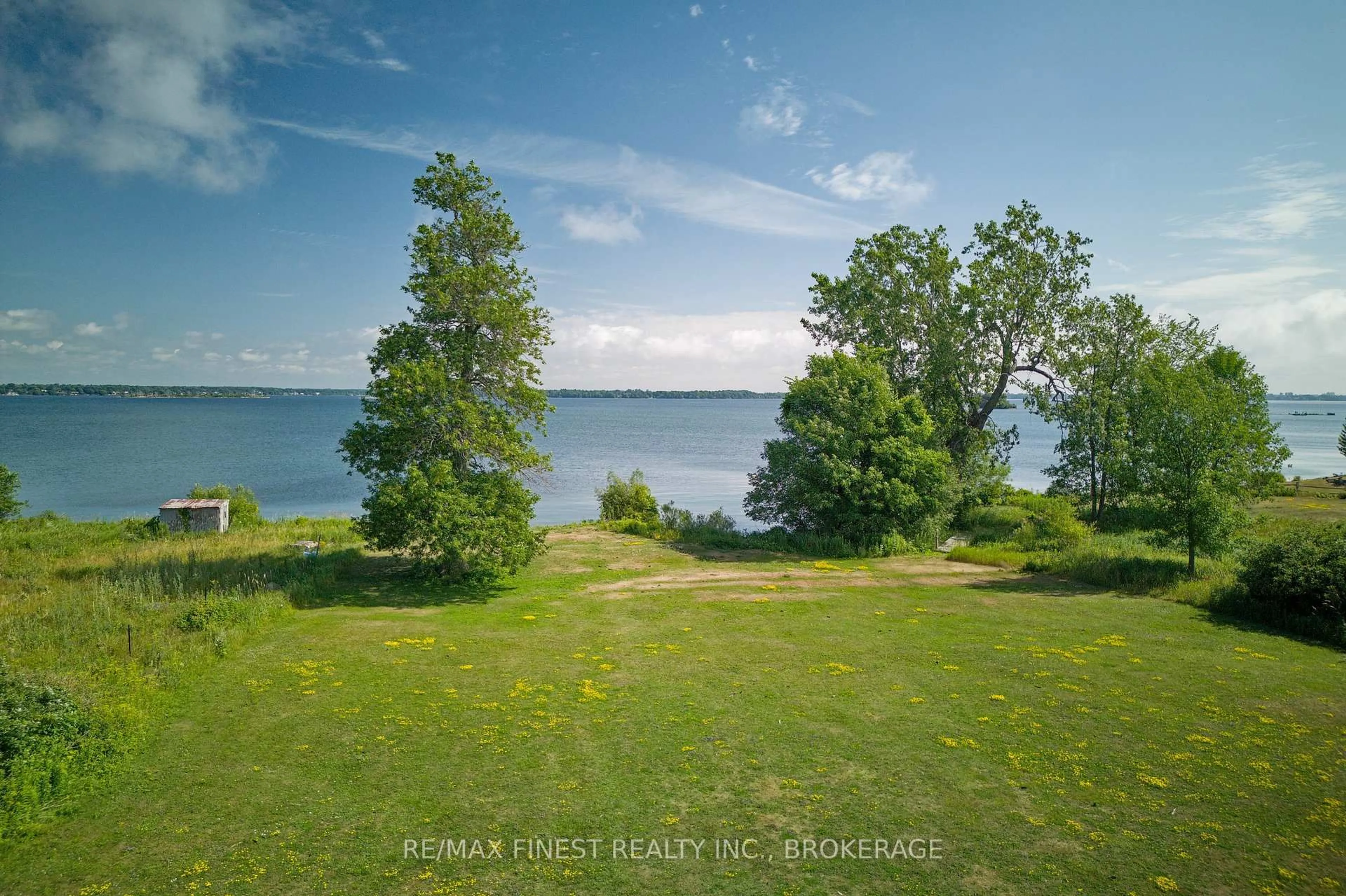 A pic from outside/outdoor area/front of a property/back of a property/a pic from drone, water/lake/river/ocean view for 10 Front Rd, Stella Ontario K0H 2S0