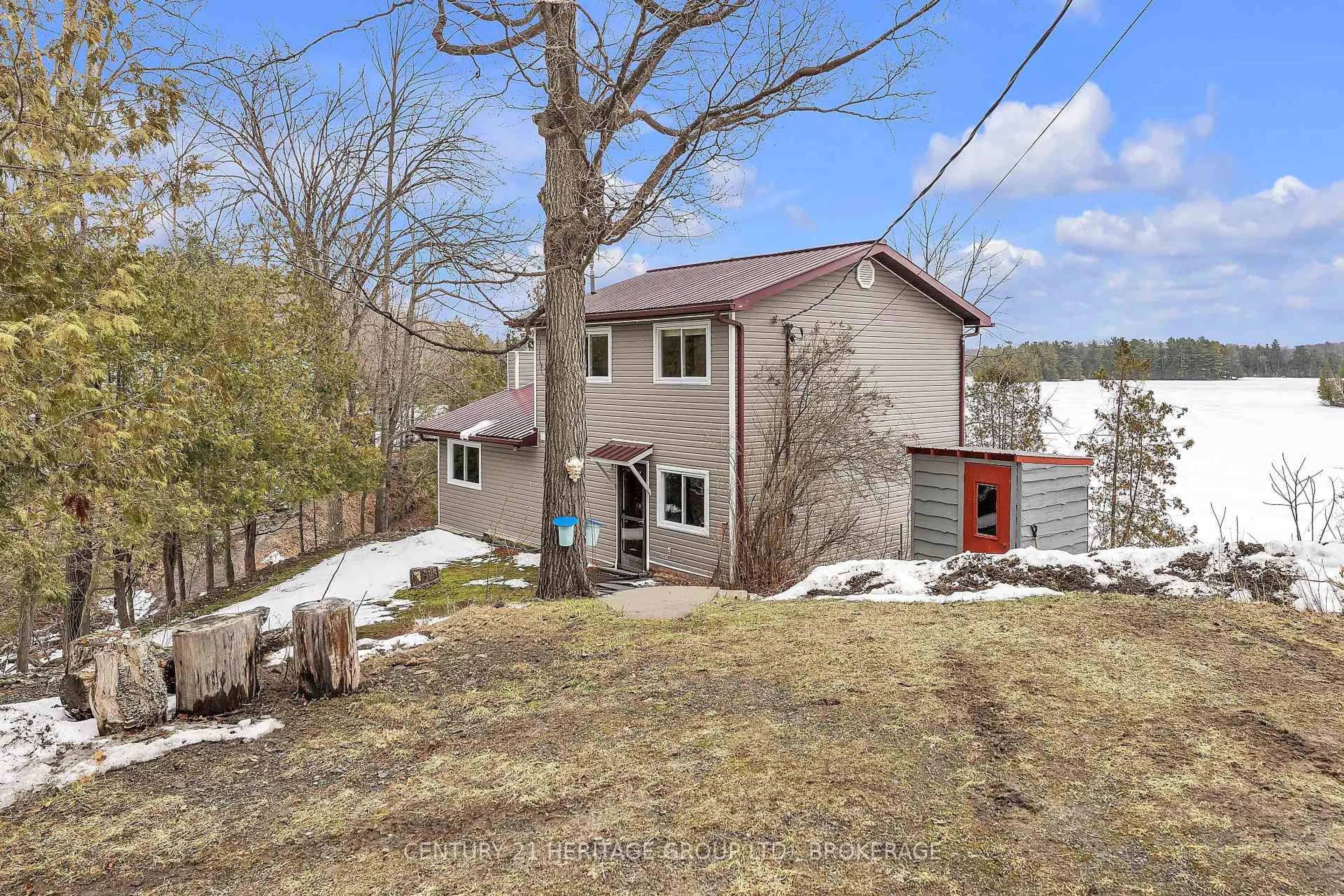 A pic from outside/outdoor area/front of a property/back of a property/a pic from drone, mountain view for 245 Taggart Lane, Rideau Lakes Ontario K0G 1X0