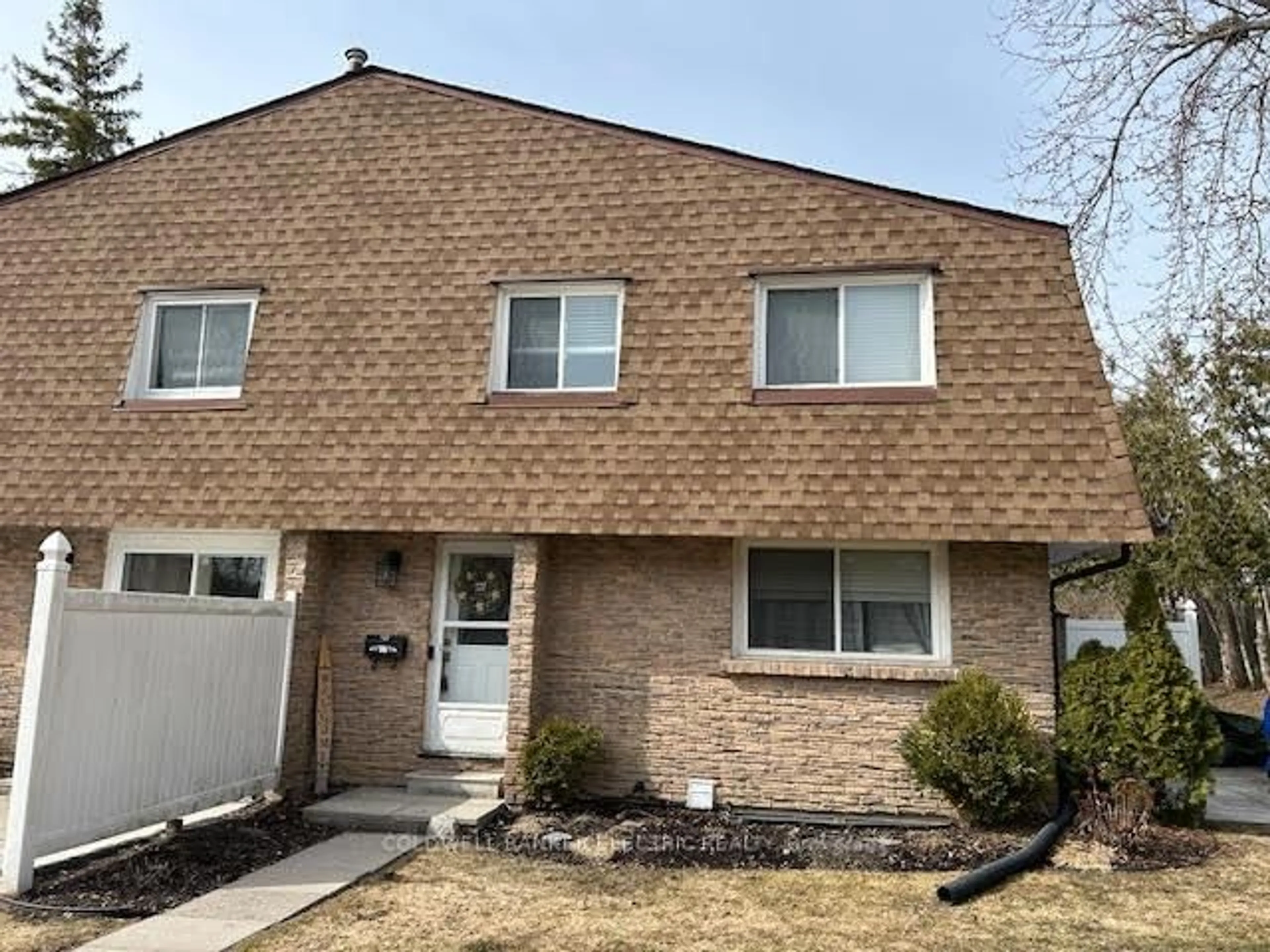 Home with vinyl exterior material, street for 740 Chamberlain St #14, Peterborough Ontario K9J 4M3