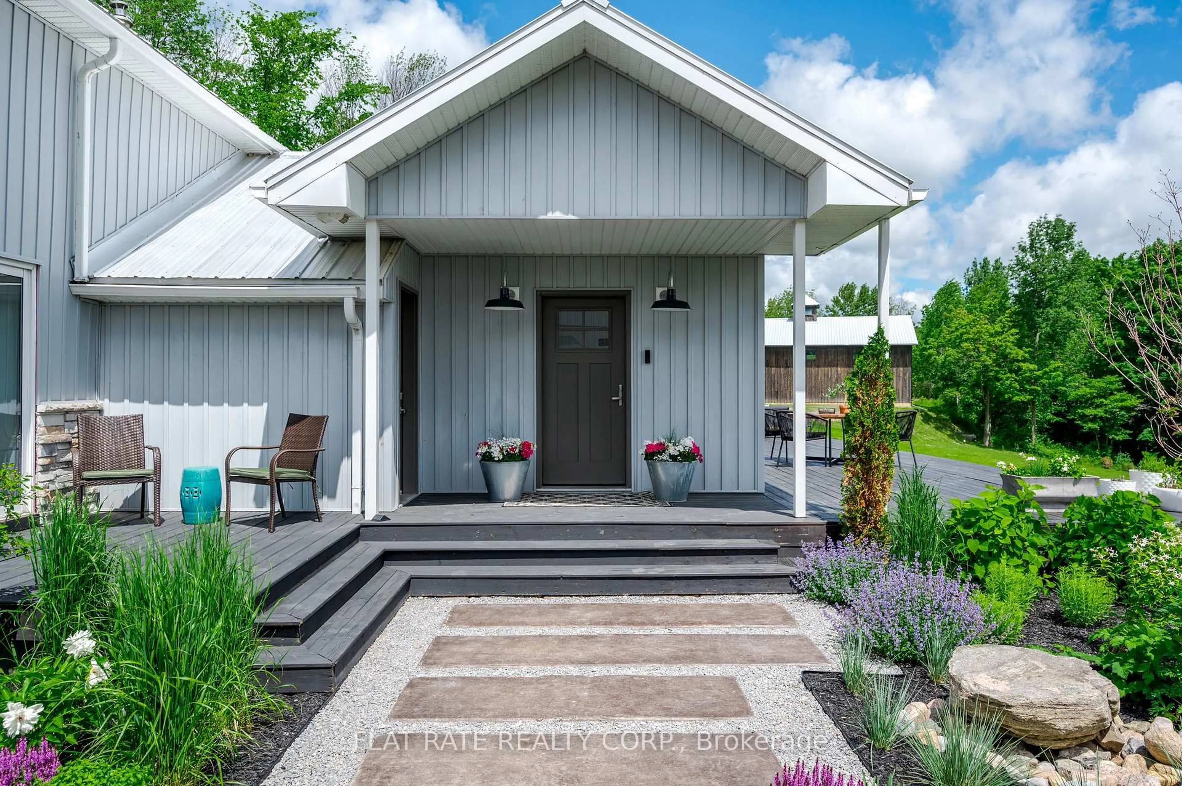 Home with vinyl exterior material, street for 1009 Serpent Mounds Rd, Otonabee-South Monaghan Ontario K0L 2G0