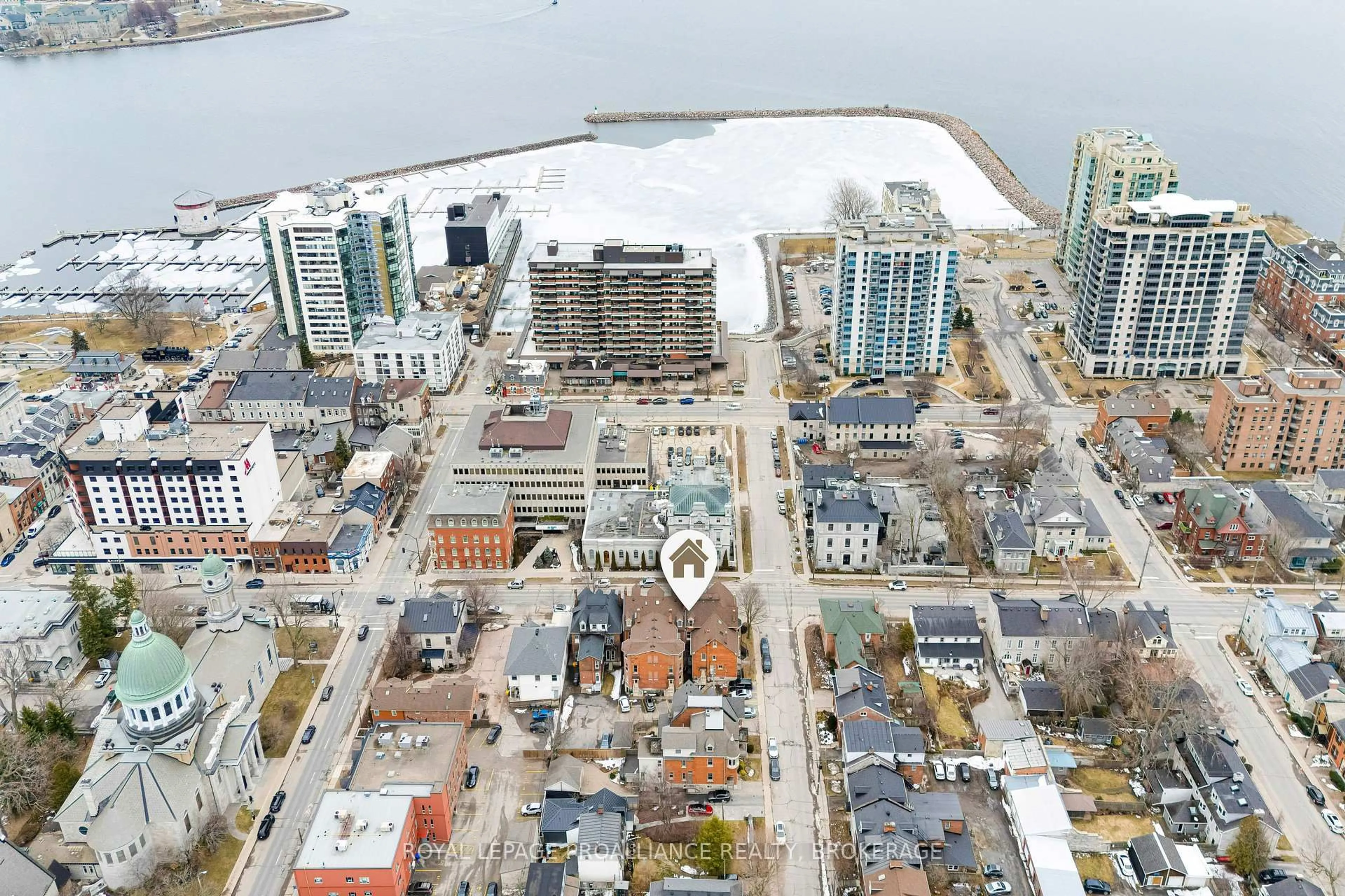 A pic from outside/outdoor area/front of a property/back of a property/a pic from drone, water/lake/river/ocean view for 250 King St #1, Kingston Ontario K7L 3A9