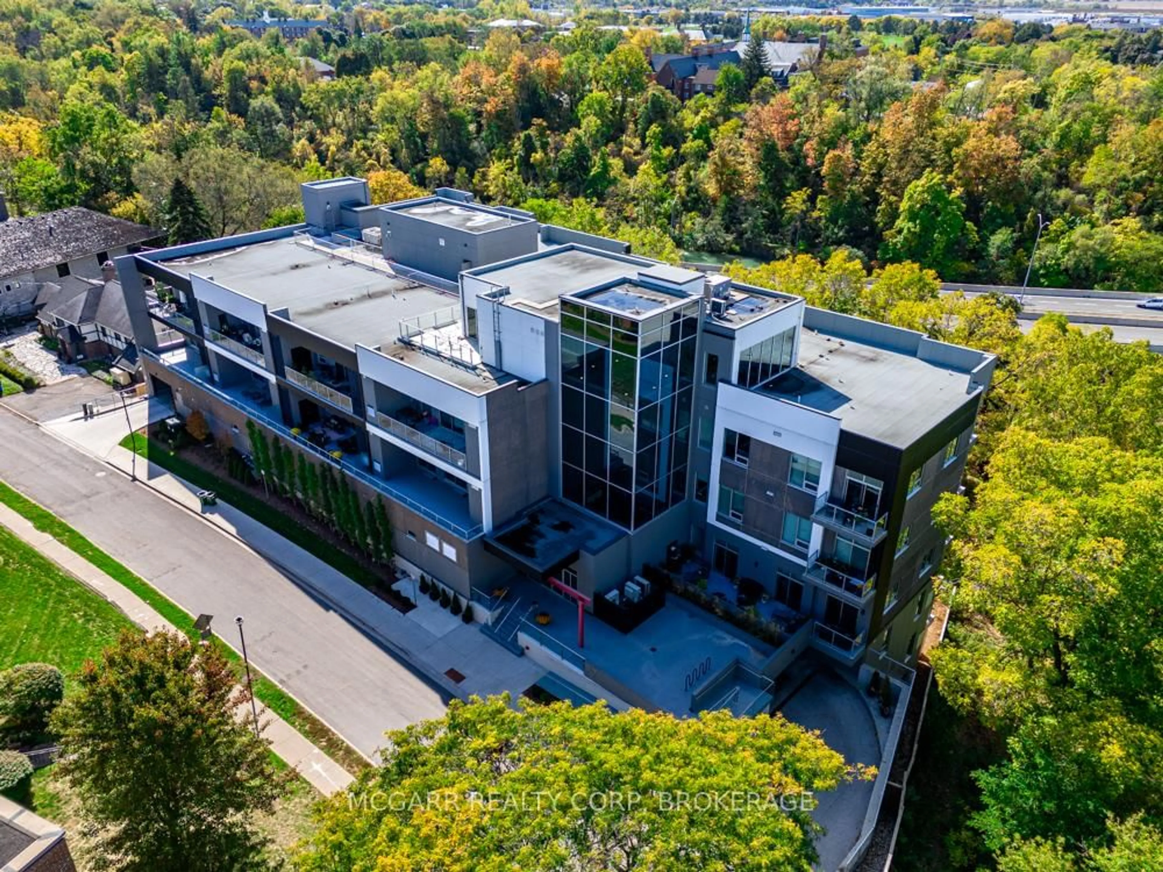 A pic from outside/outdoor area/front of a property/back of a property/a pic from drone, city buildings view from balcony for 77 Yates St #507, St. Catharines Ontario L2R 5R7
