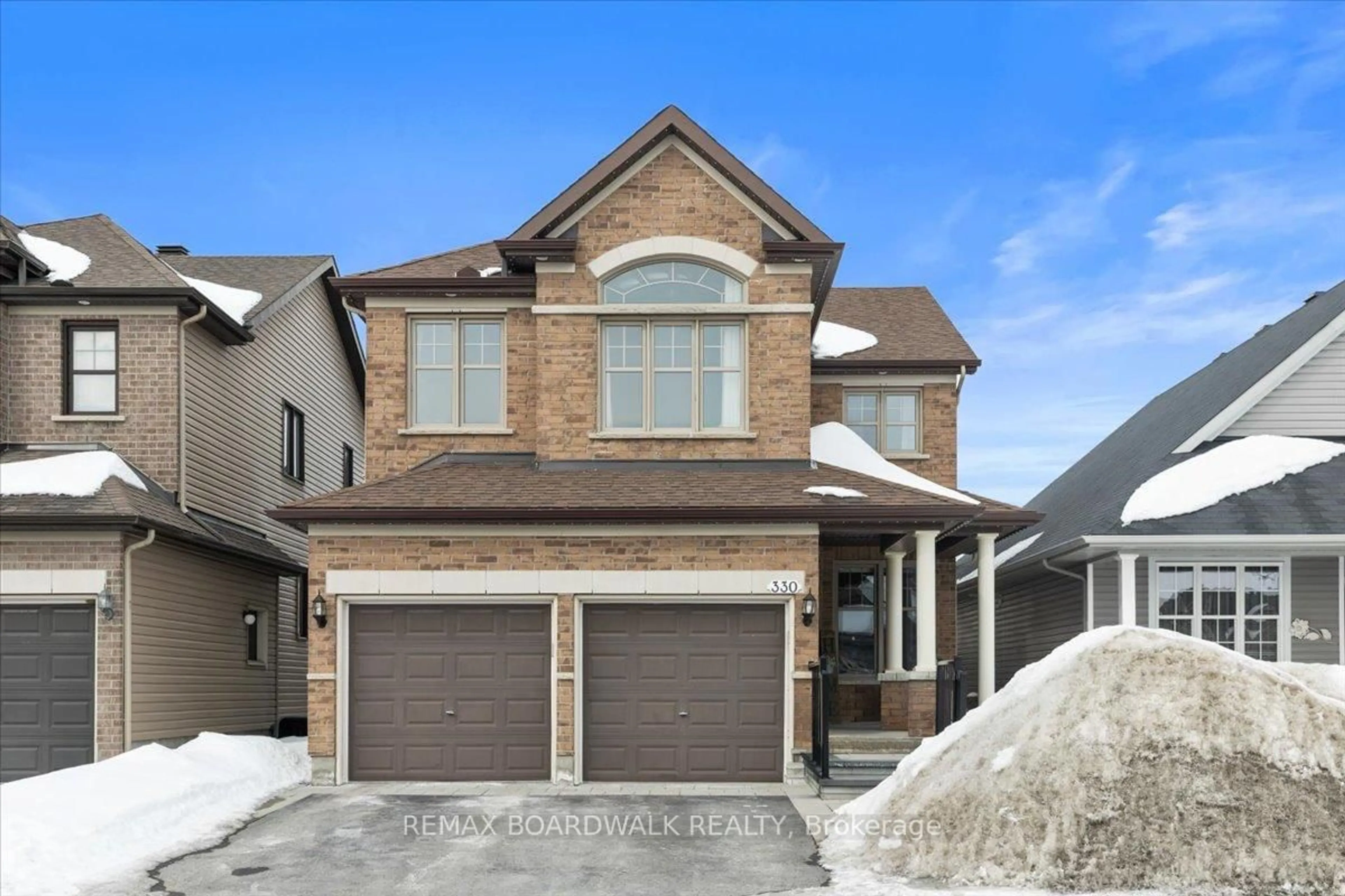 Home with brick exterior material, street for 330 Bobolink Rdge, Stittsville Ontario K2V 0B7