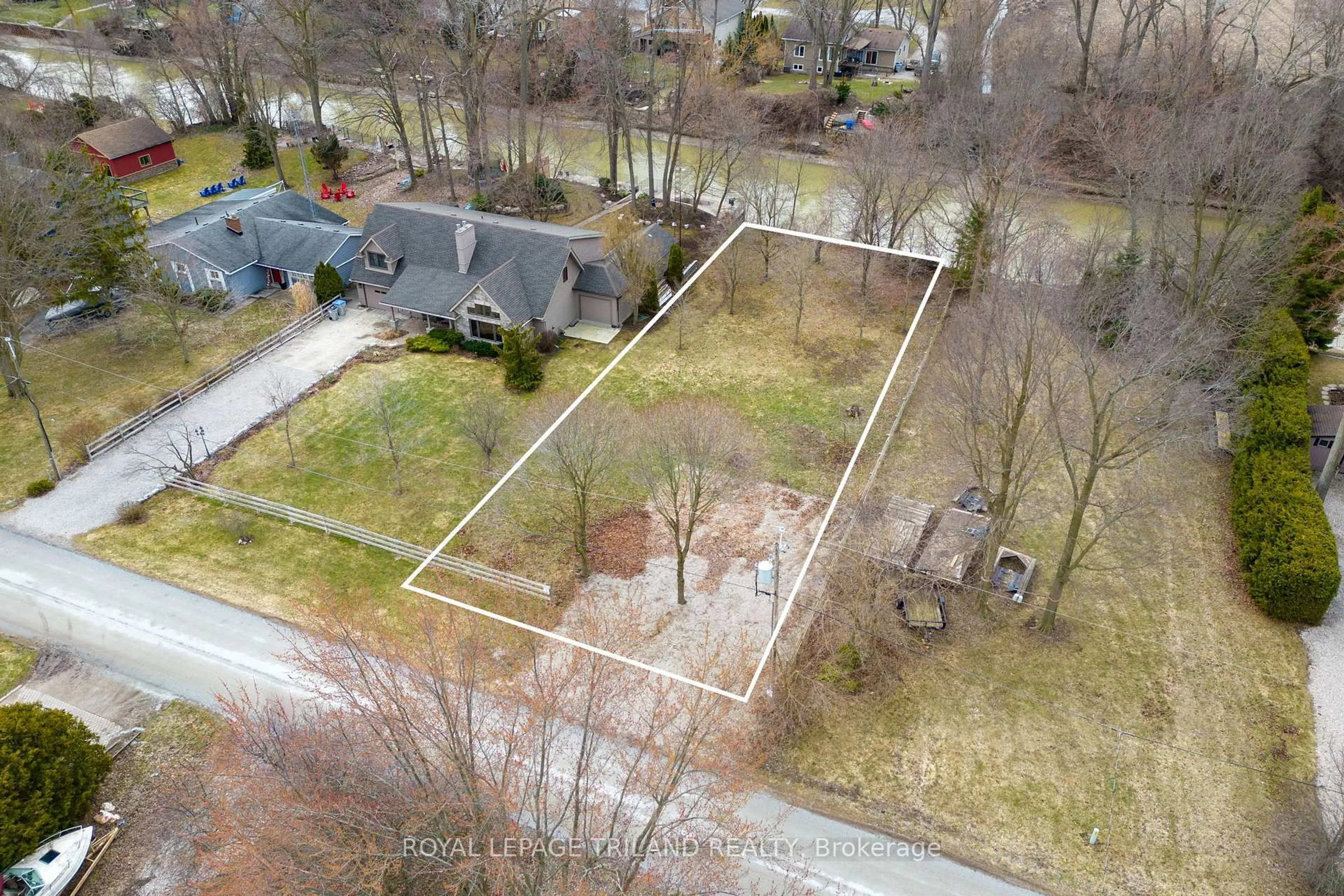 A pic from outside/outdoor area/front of a property/back of a property/a pic from drone, street for 8419 Defore Dr, Lambton Shores Ontario N0M 1T0