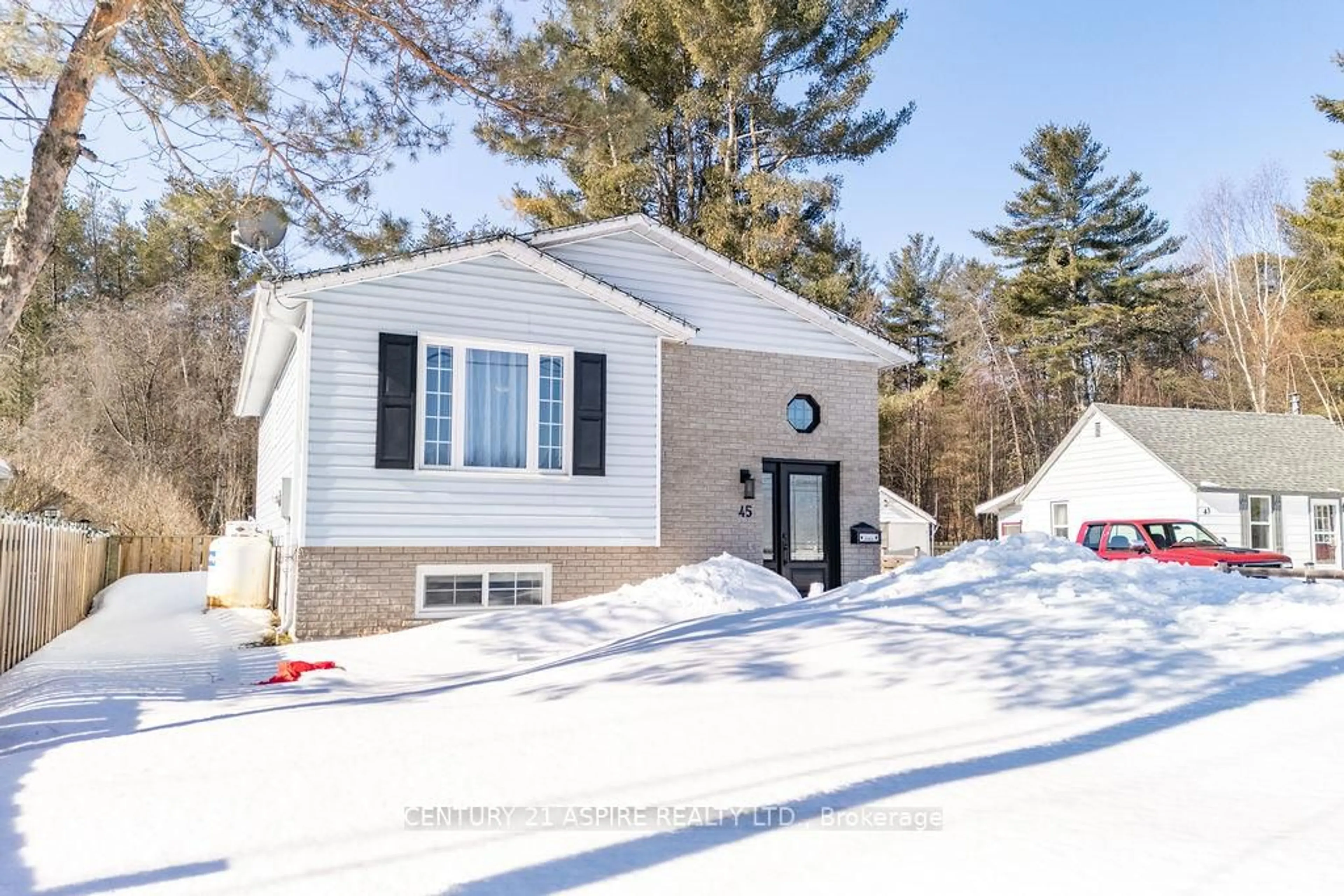 Home with vinyl exterior material, street for 45 Brumm Rd, Petawawa Ontario K8A 7G6