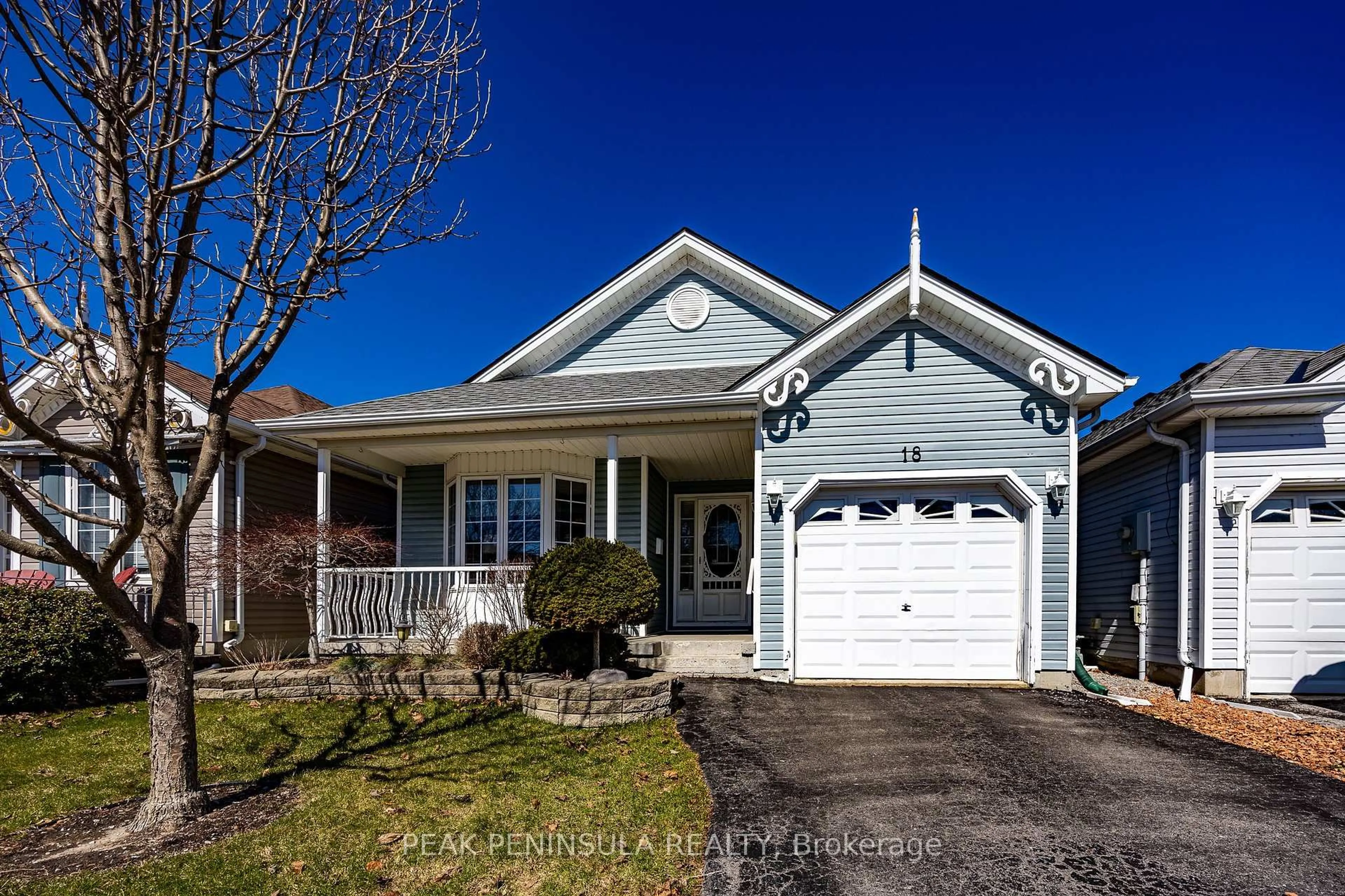 Home with vinyl exterior material, street for 18 Carolina Way, Norfolk Ontario N0E 1M0