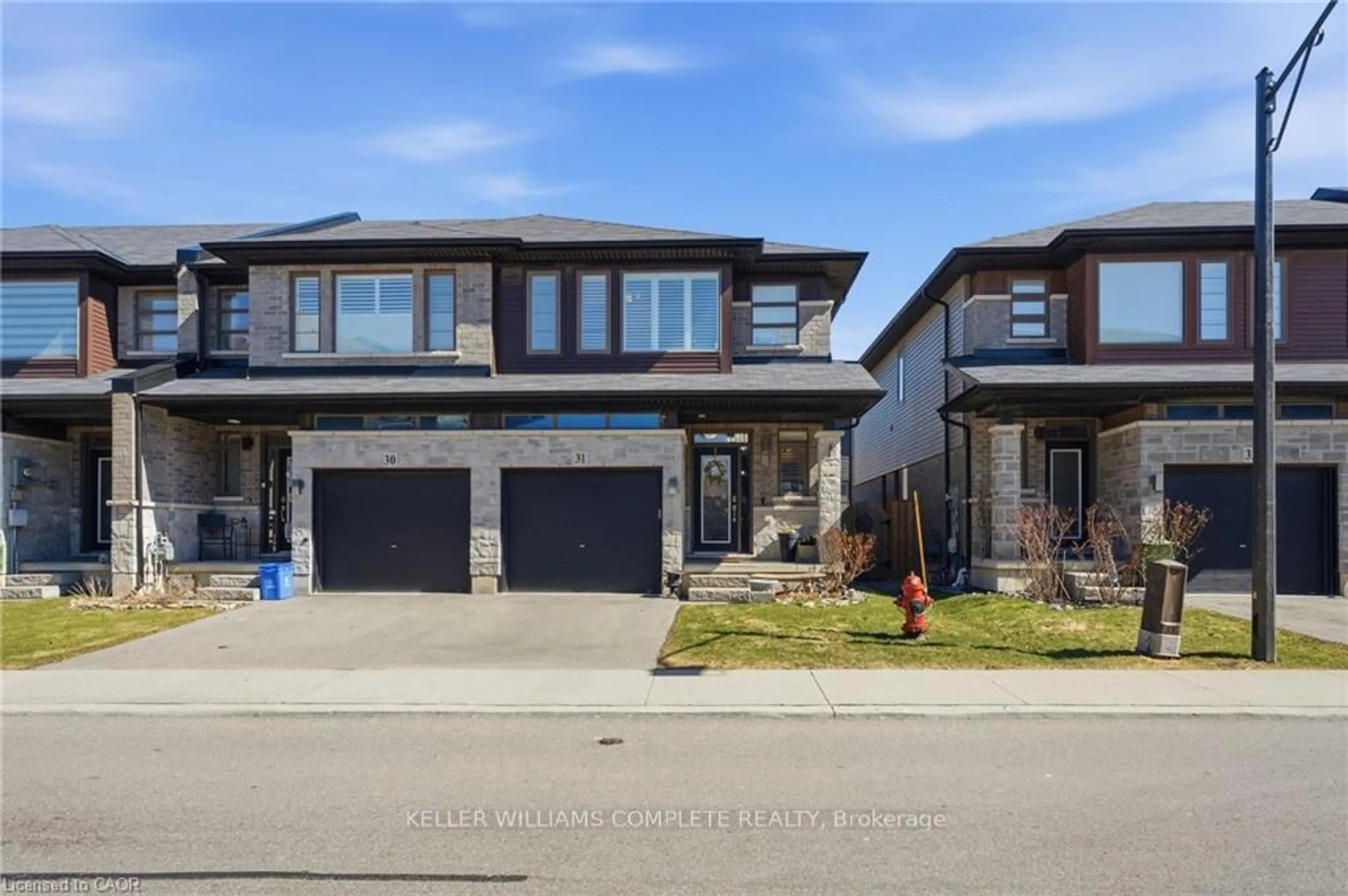 Home with brick exterior material, street for 30 TIMES SQUARE Blvd #31, Hamilton Ontario L8J 0L8